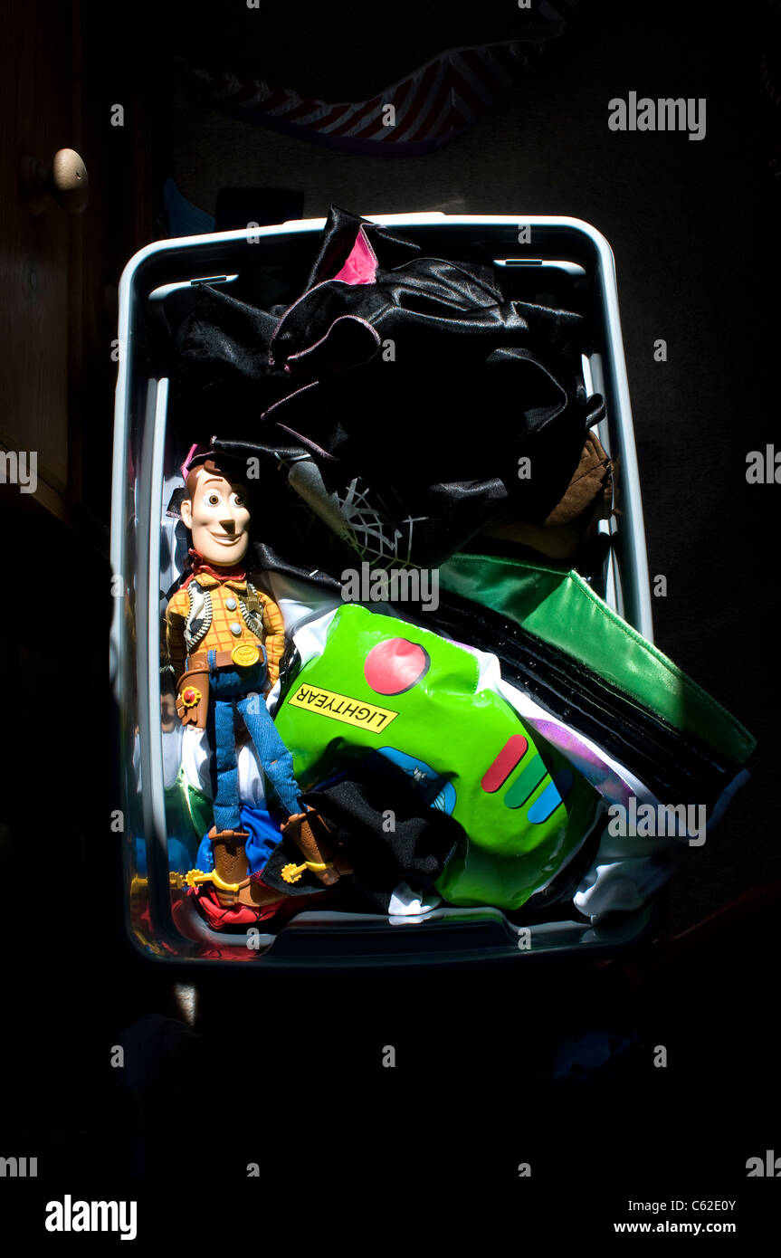 toy box with woody and buzz lightyear outfit,Woody, cowboy, hero, heroic, “toy, story”, child’s, toy Stock Photo