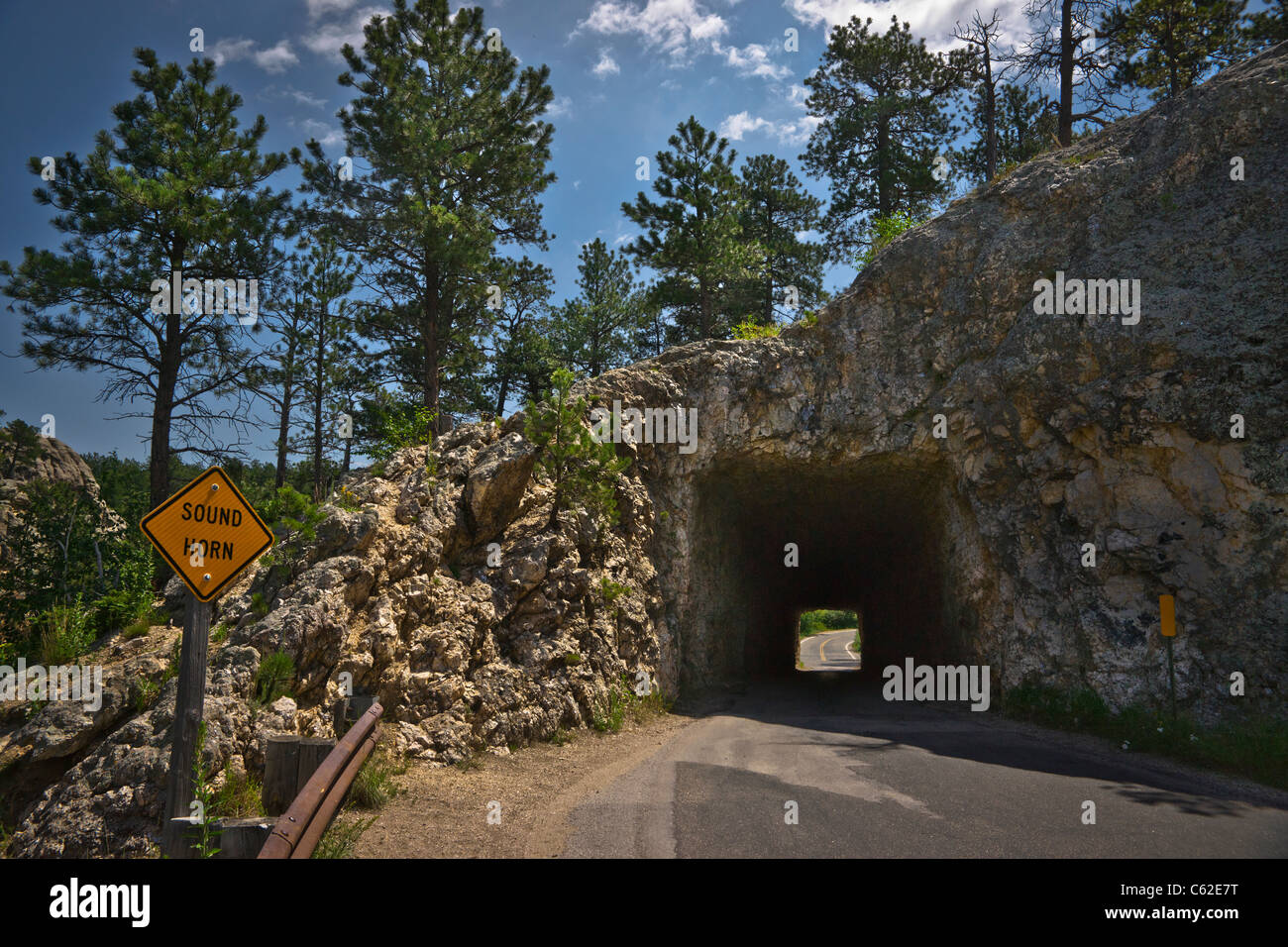 Black Hills South Dakota landscape A view through a tunnel in a rmountain and a empty road nobody hi-res Stock Photo