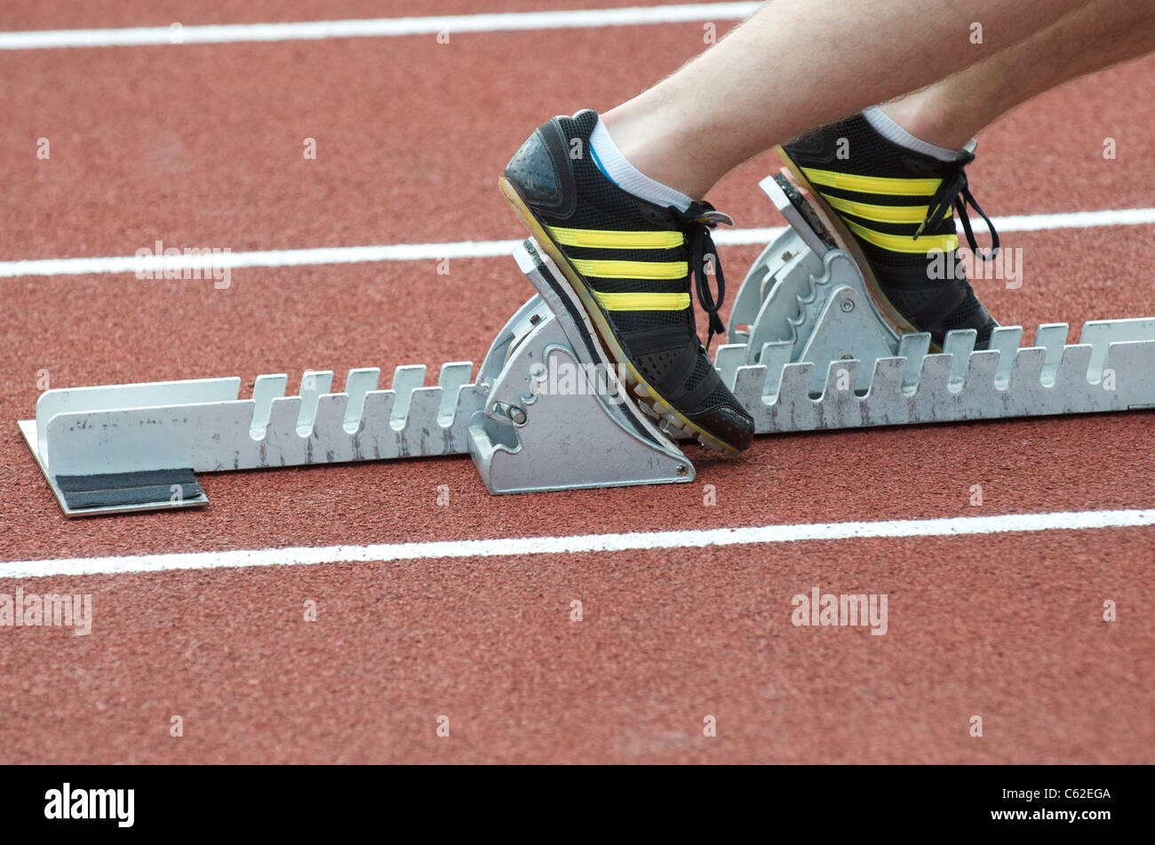 starting blocks on an athletics track Stock Photo Alamy