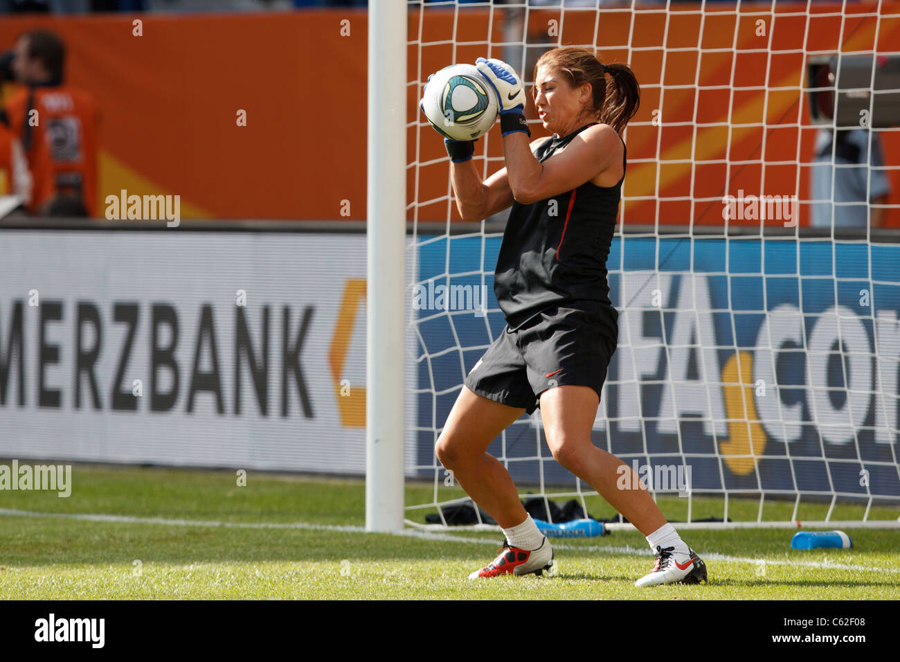 USA goalkeeper Hope Solo makes a save during team warmups prior to a 2011 FIFA Women's World Cup match against Columbia. Stock Photo