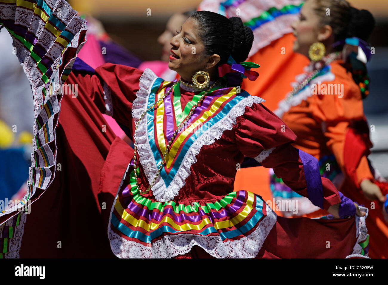 Colorful Mexican dancers perform Stock Photo