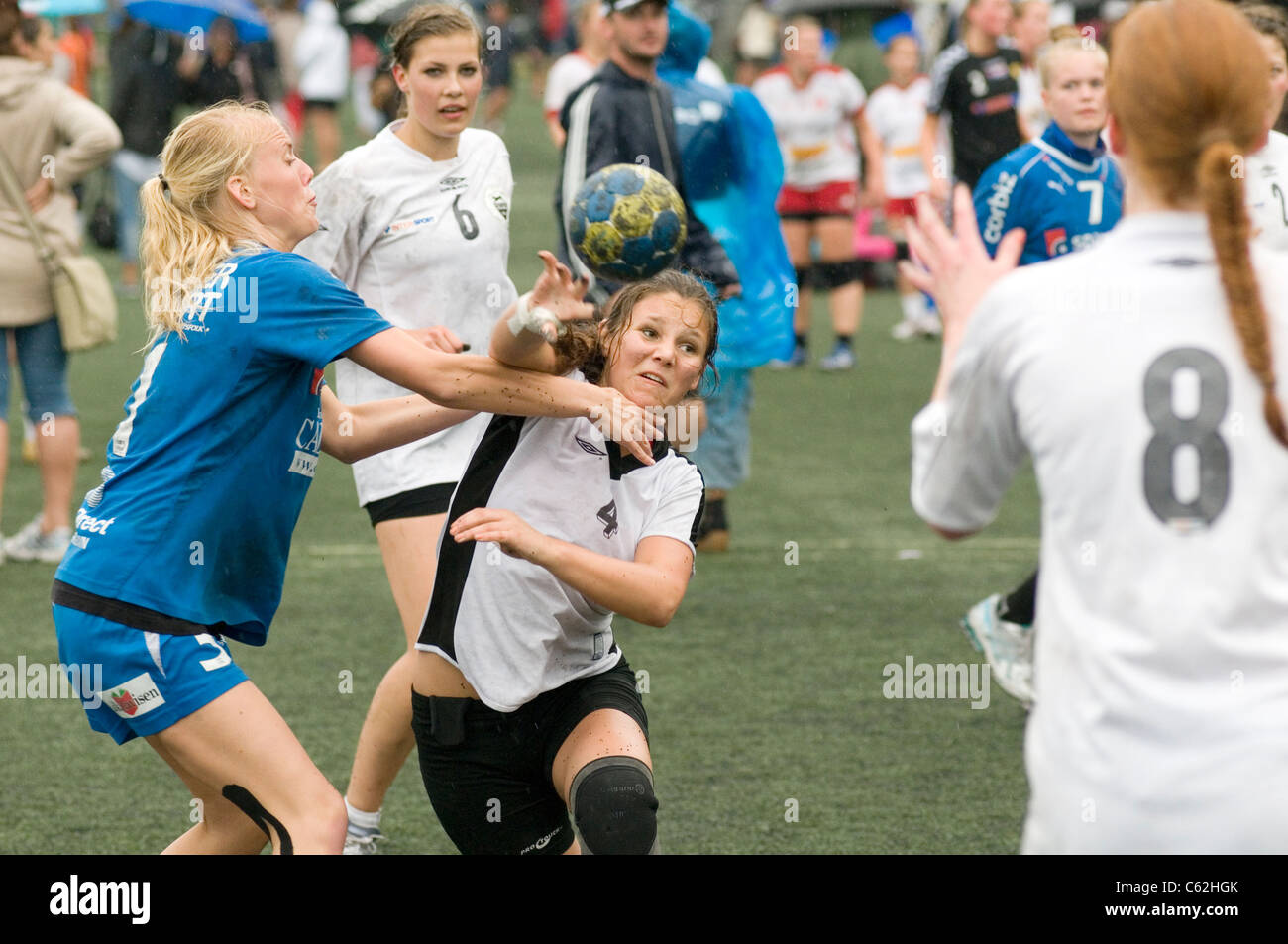 handball hand ball womens sport field sports team game games competitive competition determined determination look on player pla Stock Photo