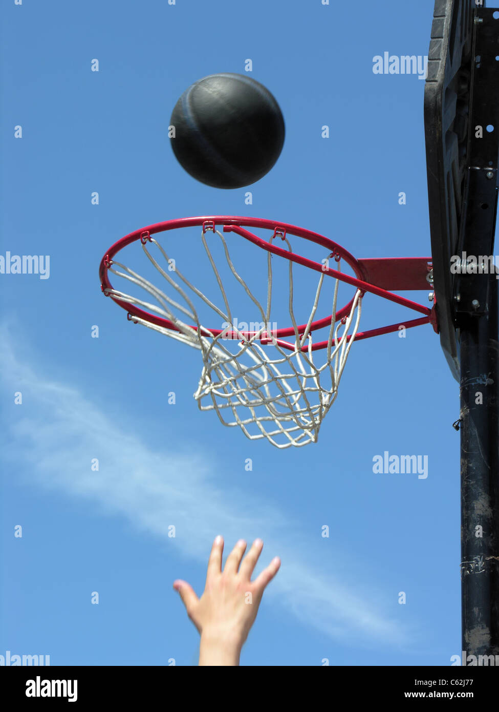 street basketball moment, focused on basketball hoop Stock Photo Alamy
