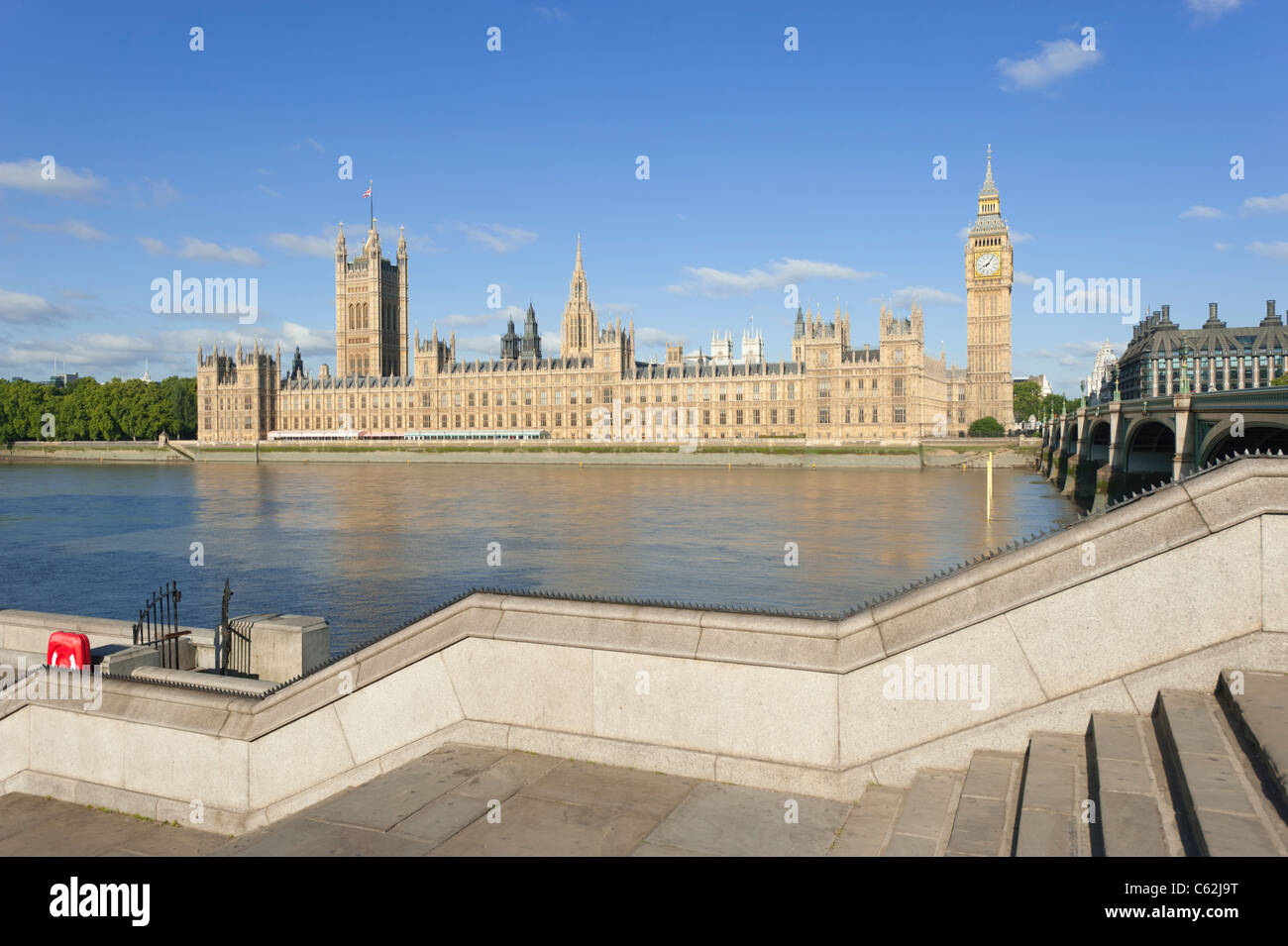 The Houses of Parliament in London, England, UK, beside the River Thames. As seen from the opposite bank. Stock Photo