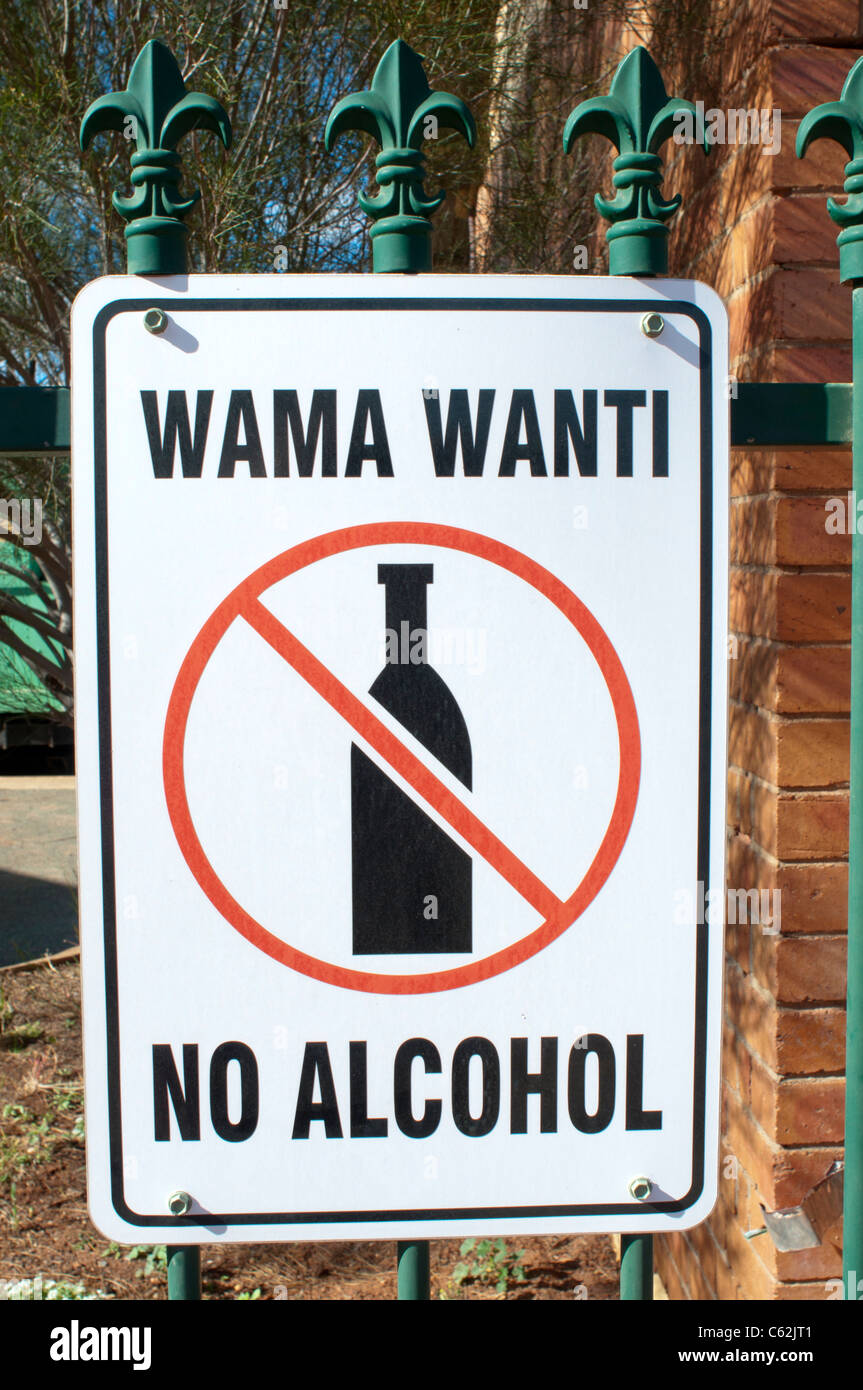 Sign in aboriginal dialect and English warning of alcohol ban in a Kalgoorlie park, Western Australia Stock Photo