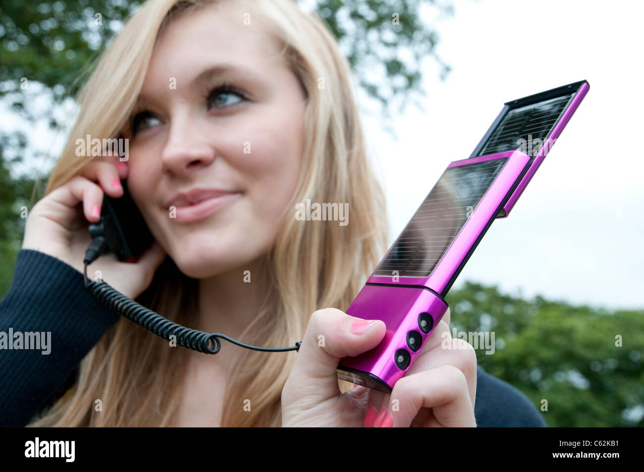 mobile phone solar powered battery charger Stock Photo Alamy
