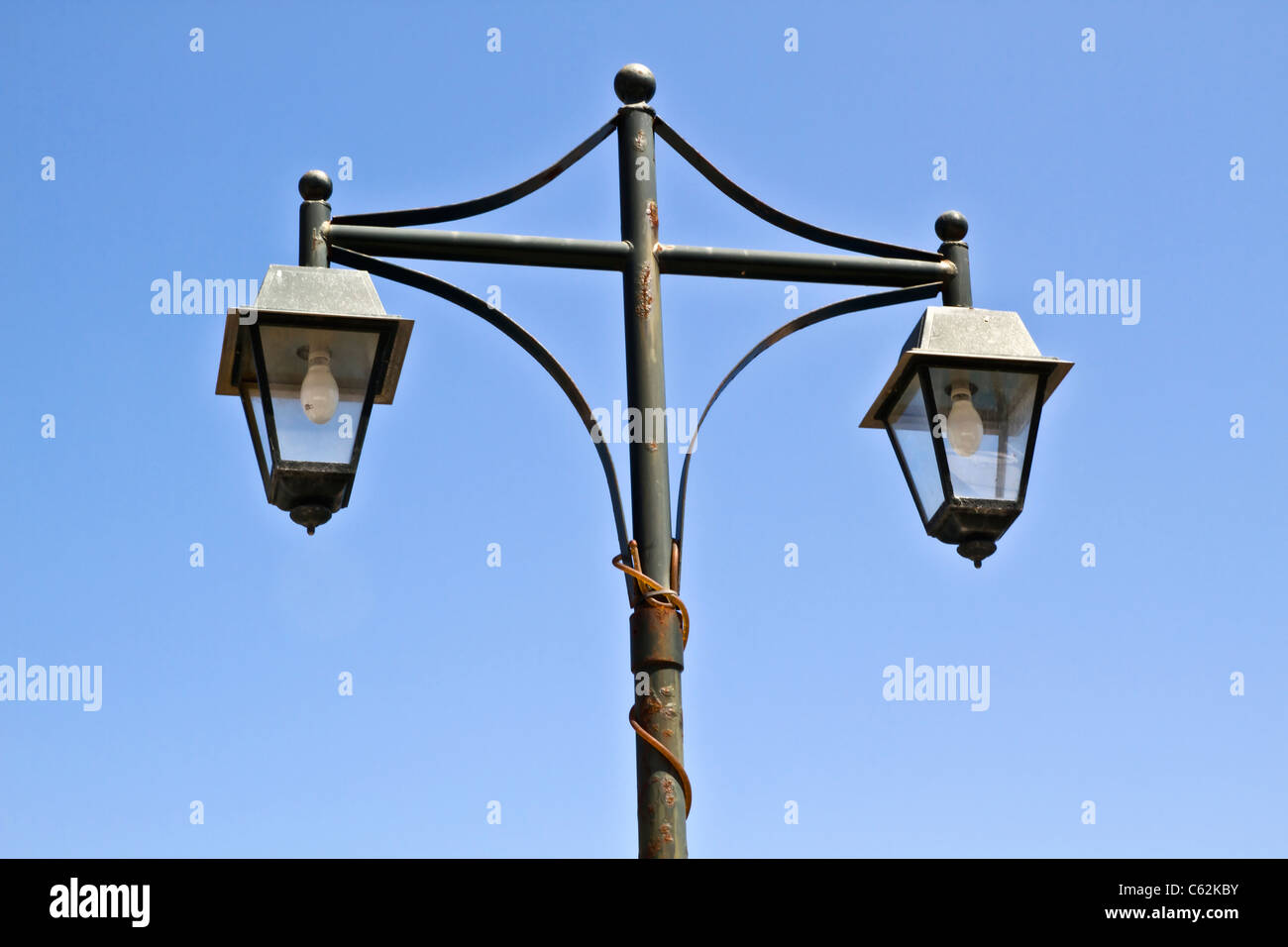 Street lamps isolated on blue sky in Rodes Stock Photo