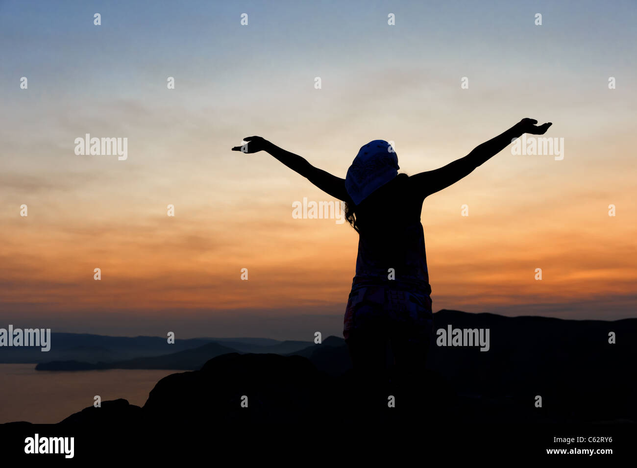 Silhouette woman open hands hi-res stock photography and images - Alamy