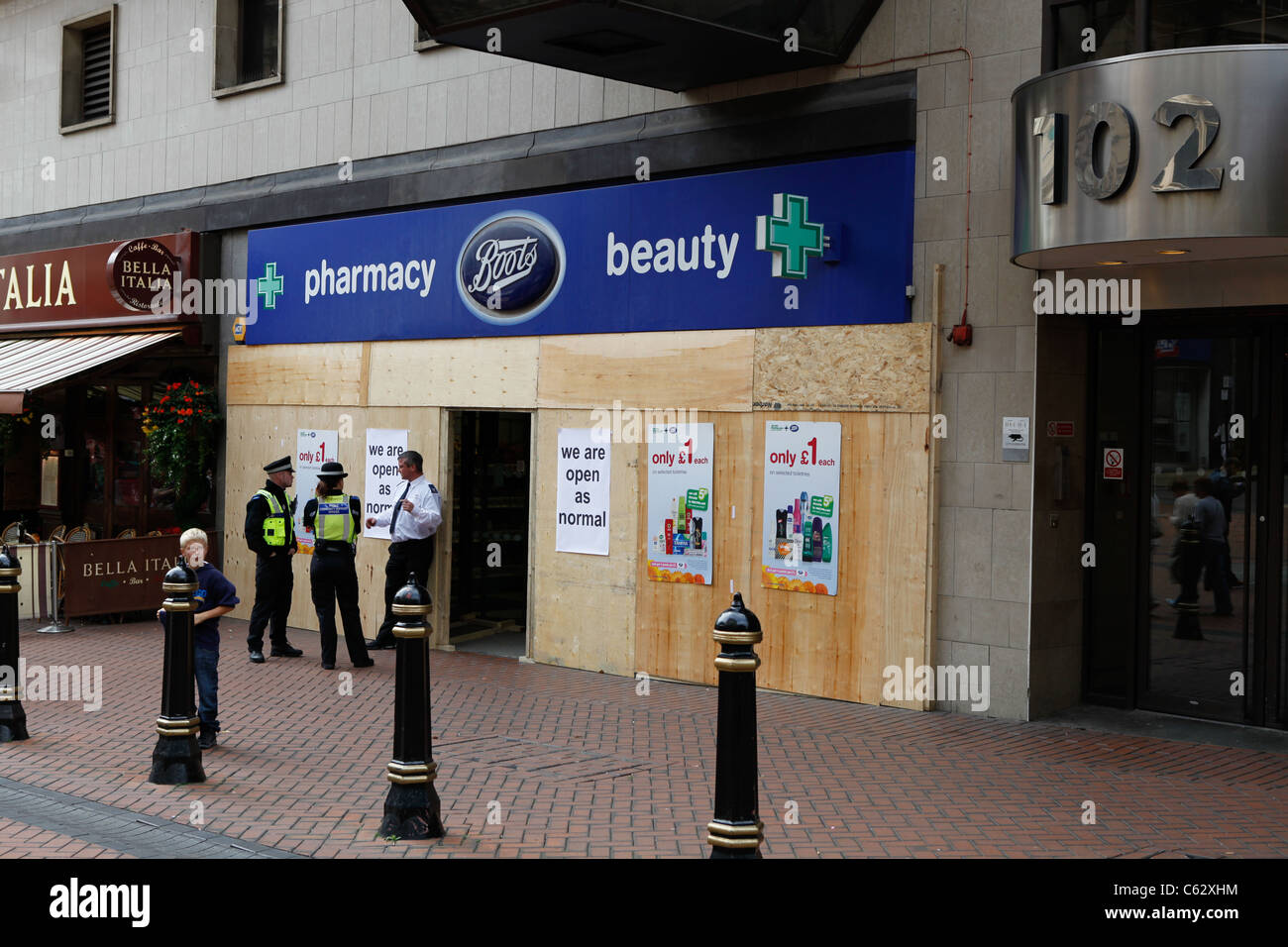New Street Birmingham UK with boarded up shop after riot in August 2011 Stock Photo