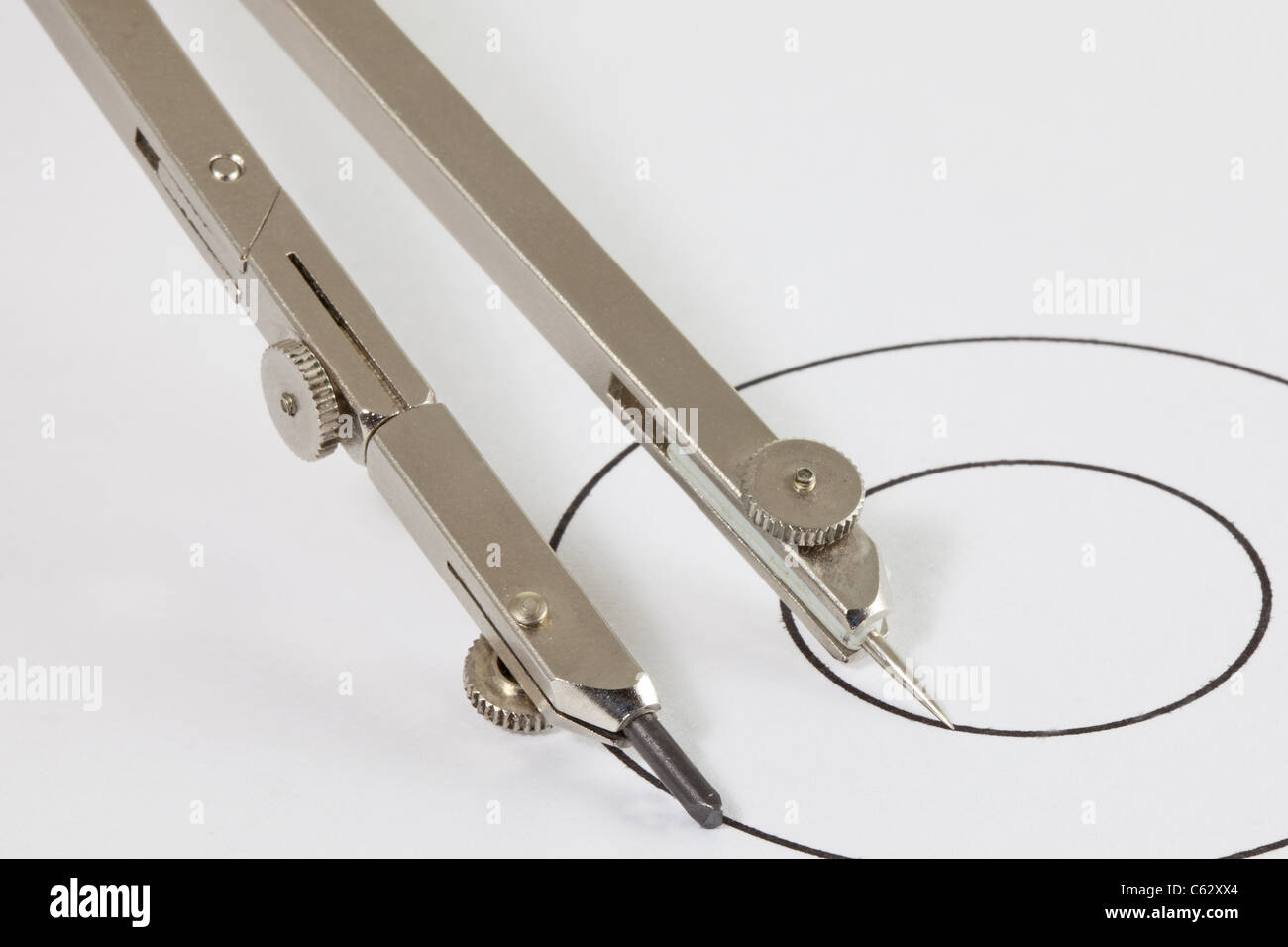 A pair of compasses on circles Stock Photo Alamy