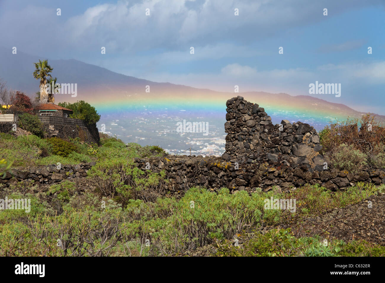 Rainbow over an old broken wall at Mazo, La Palma, Canary islands, Spain, Europe Stock Photo