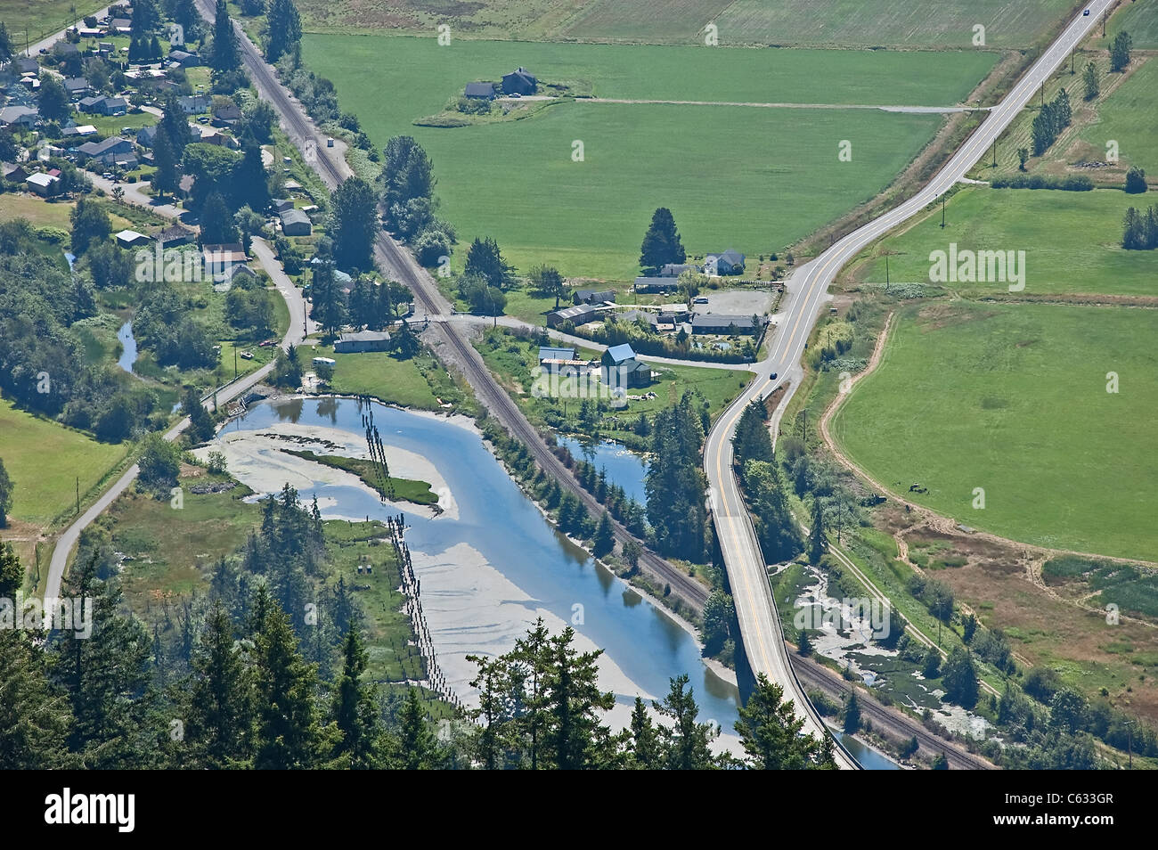 Aerial view of a small town, country life with roads, rivers, farms and fields of Blanchard, WA in Skagit County, America. Stock Photo