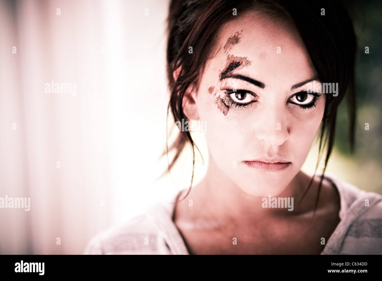 Portrait of woman with scars on face Stock Photo