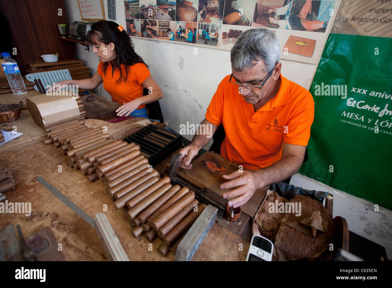 Worker producing cigars, tobacco manufacture El Sitio, Brena Alta, La Palma, Canary islands, Spain, Europe Stock Photo