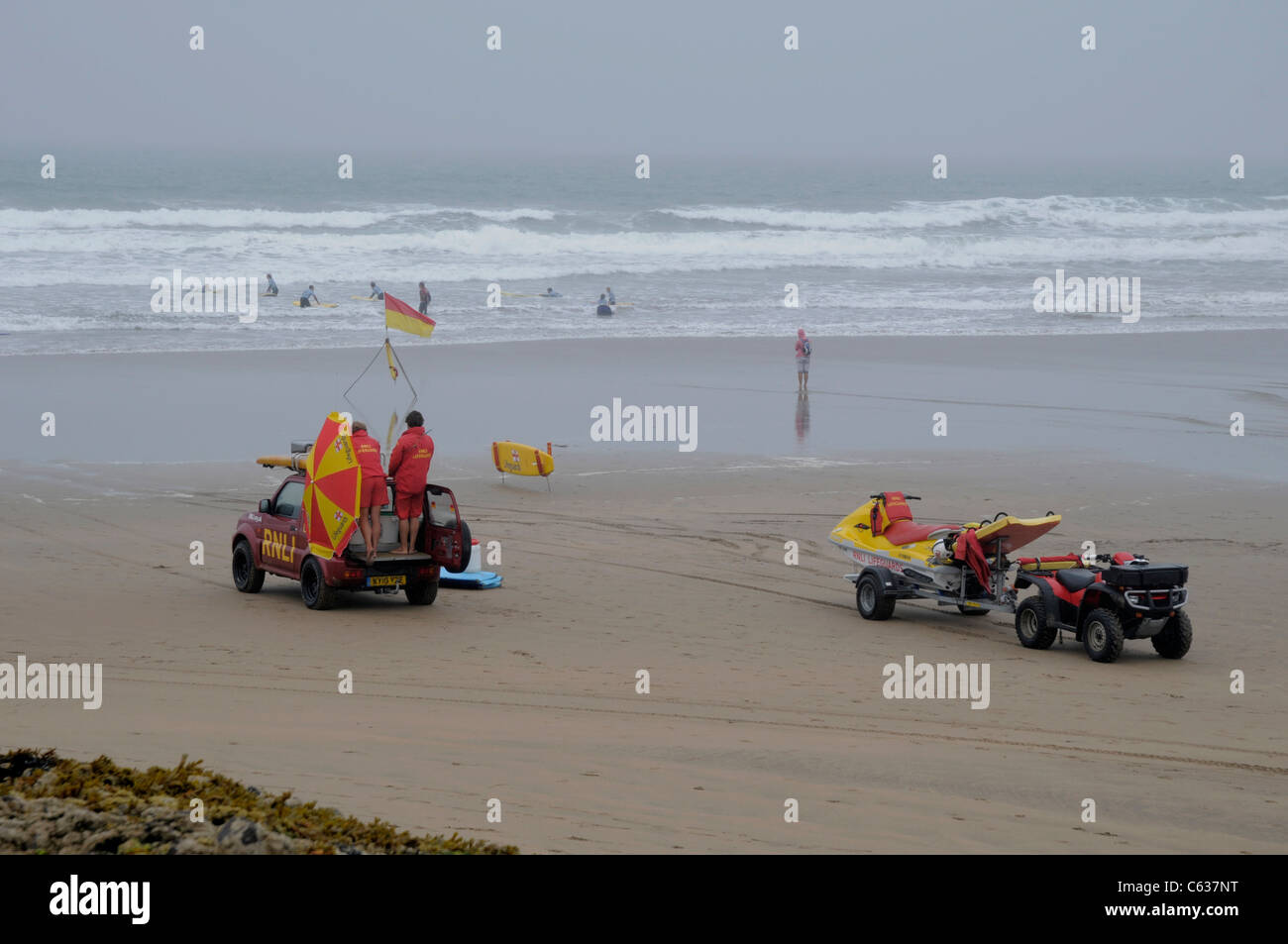 Lifeguards on Beach Misty Day at Summerleaze Beach, Bude, Cornwall Stock Photo