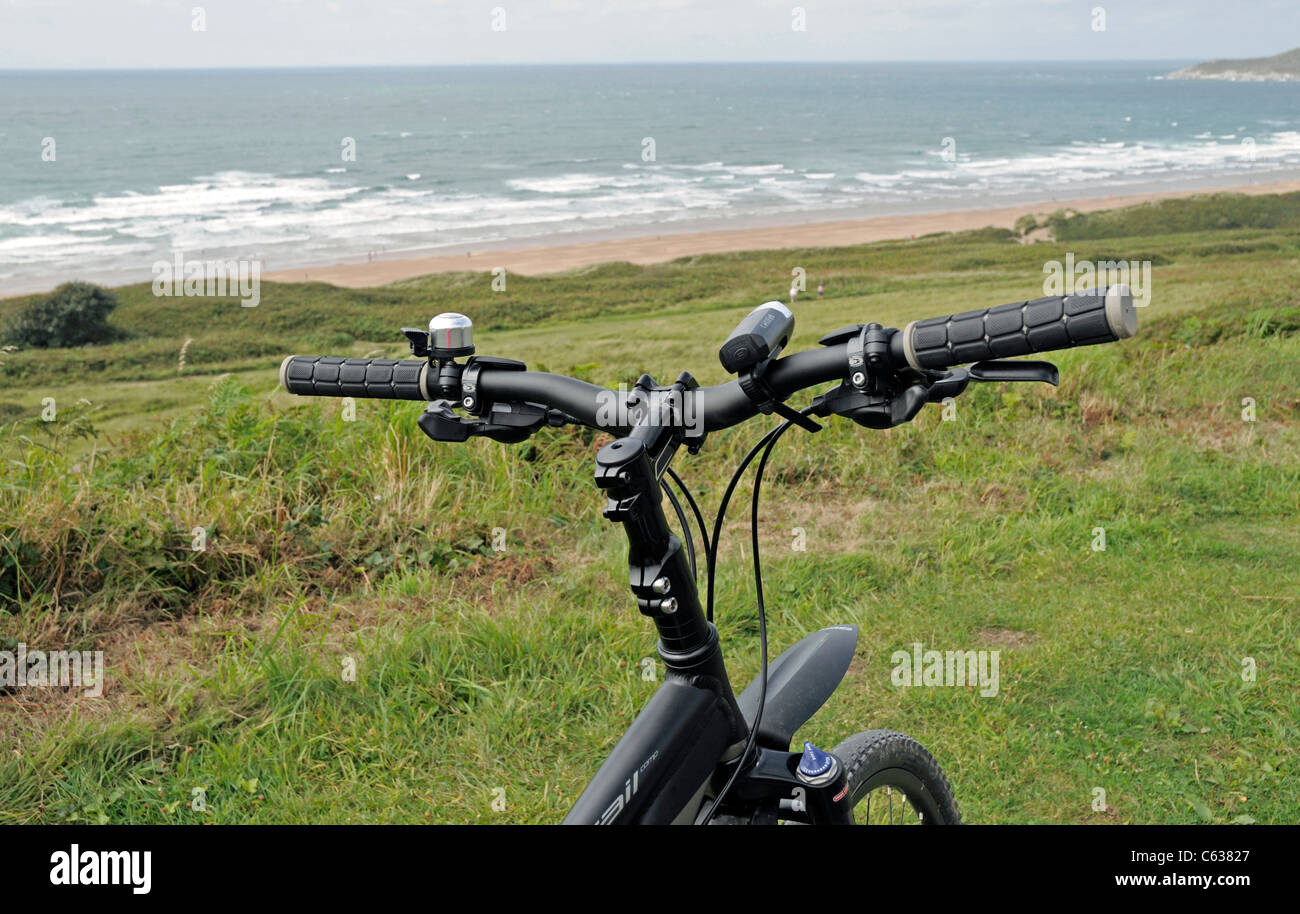 Bicycle on Cycle Path Overlooking Woolacombe Beach, North Devon, UK Stock Photo