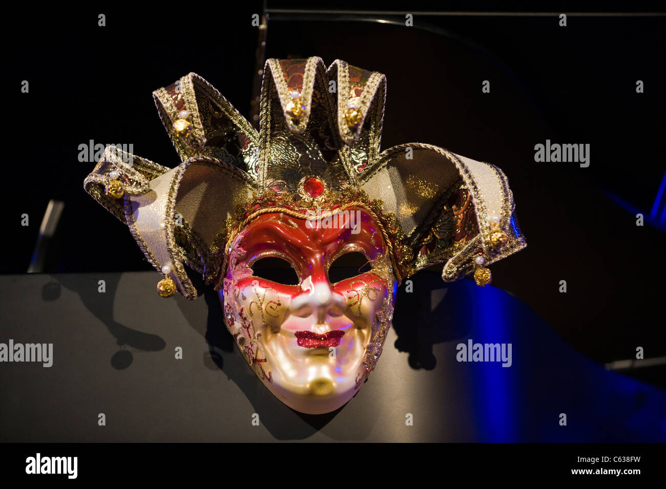 Mardi Gras mask on piano of Allen Toussaint legendary New Orleans pianist and songwriter performing at Brecon Jazz Festival 2011 Stock Photo