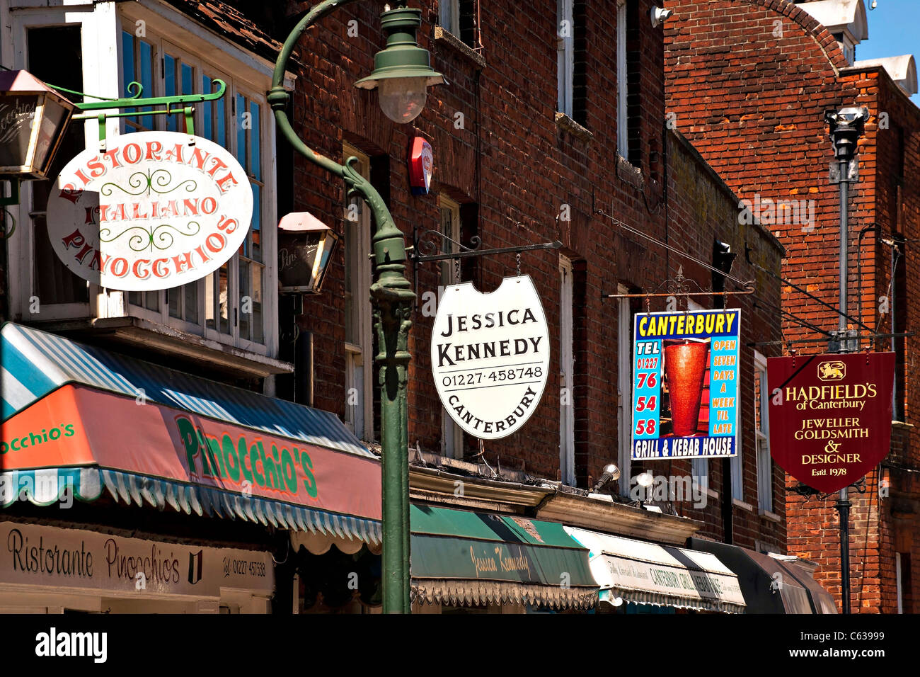 CANTERBURY, KENT, UK - JUNE 26, 2011:  Colourful shop signs in Canterbury Stock Photo