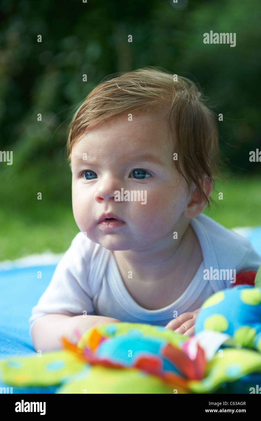 Babies lying on blankets hires stock photography and images Alamy