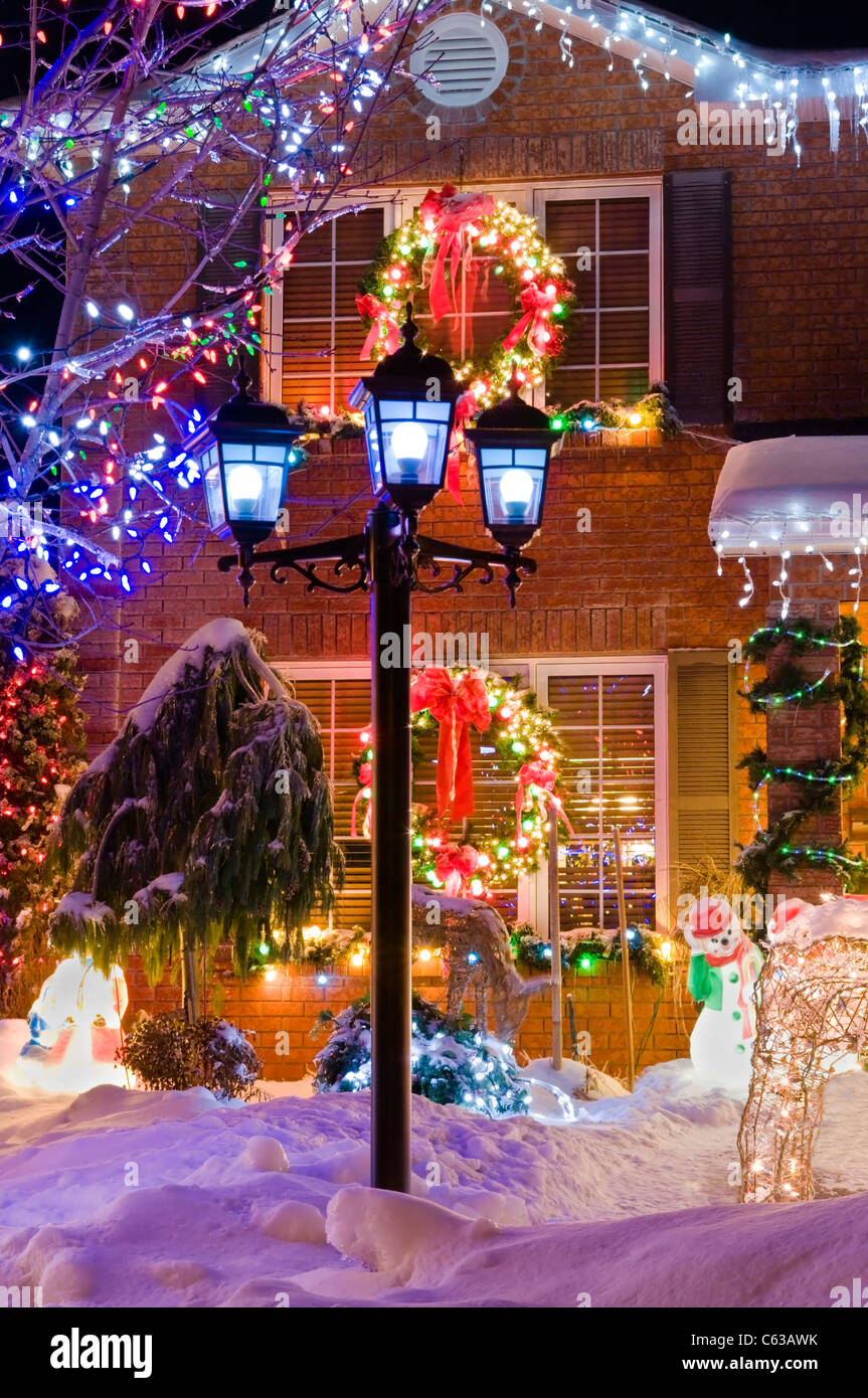 Urban Christmas scene of a beautiful home in northern Canada. Stock Photo