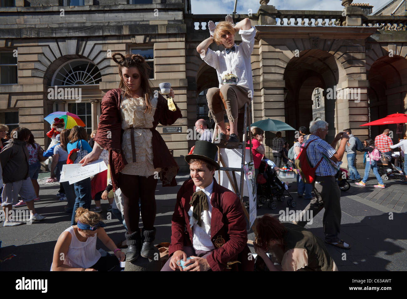 Fringe performers promote their shows on Edinburgh's Royal Mile, during the 2011 Edinburgh Festival Stock Photo