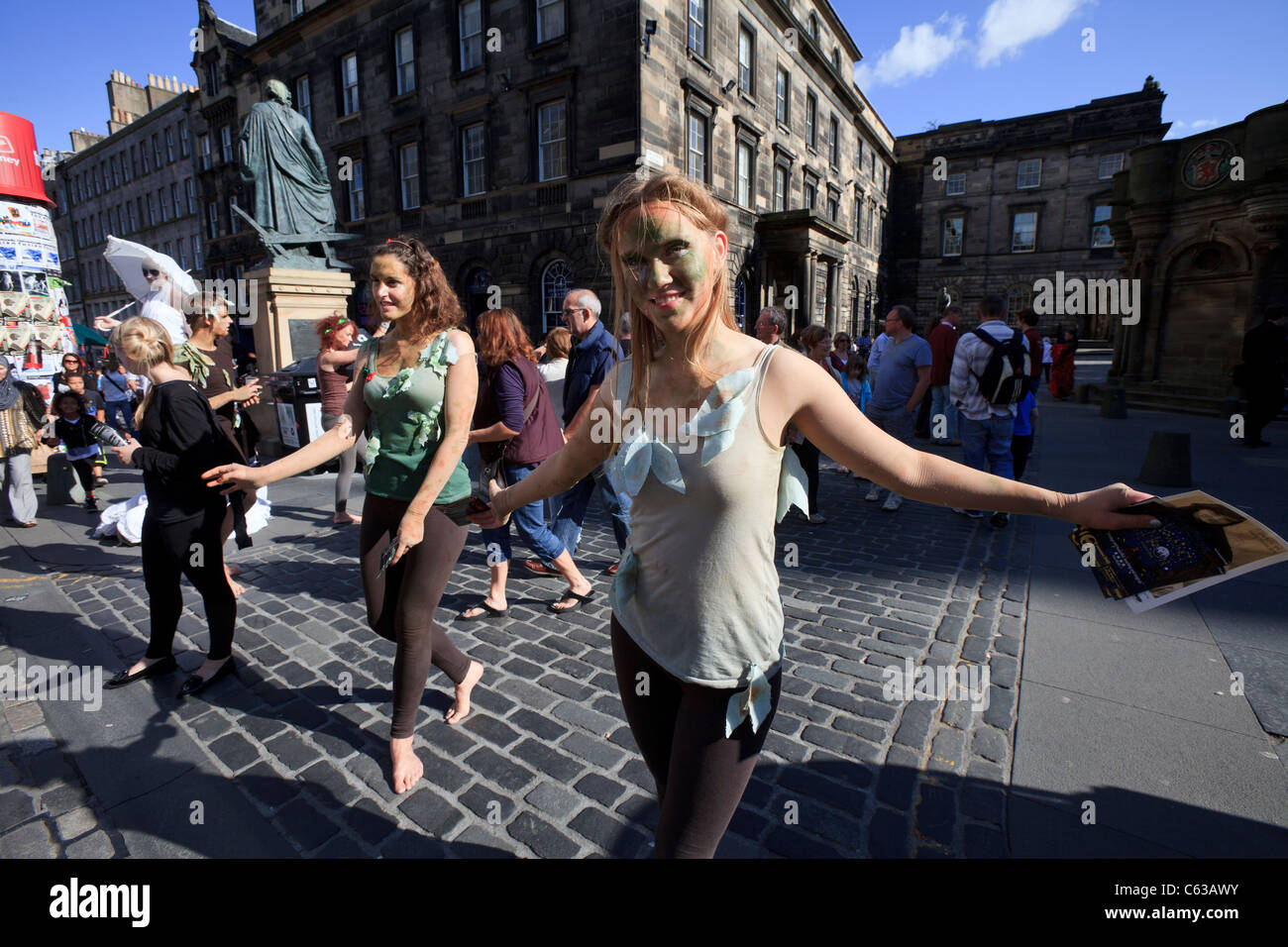 Fringe performers promote their shows on Edinburgh's Royal Mile, during the 2011 Edinburgh Festival Stock Photo