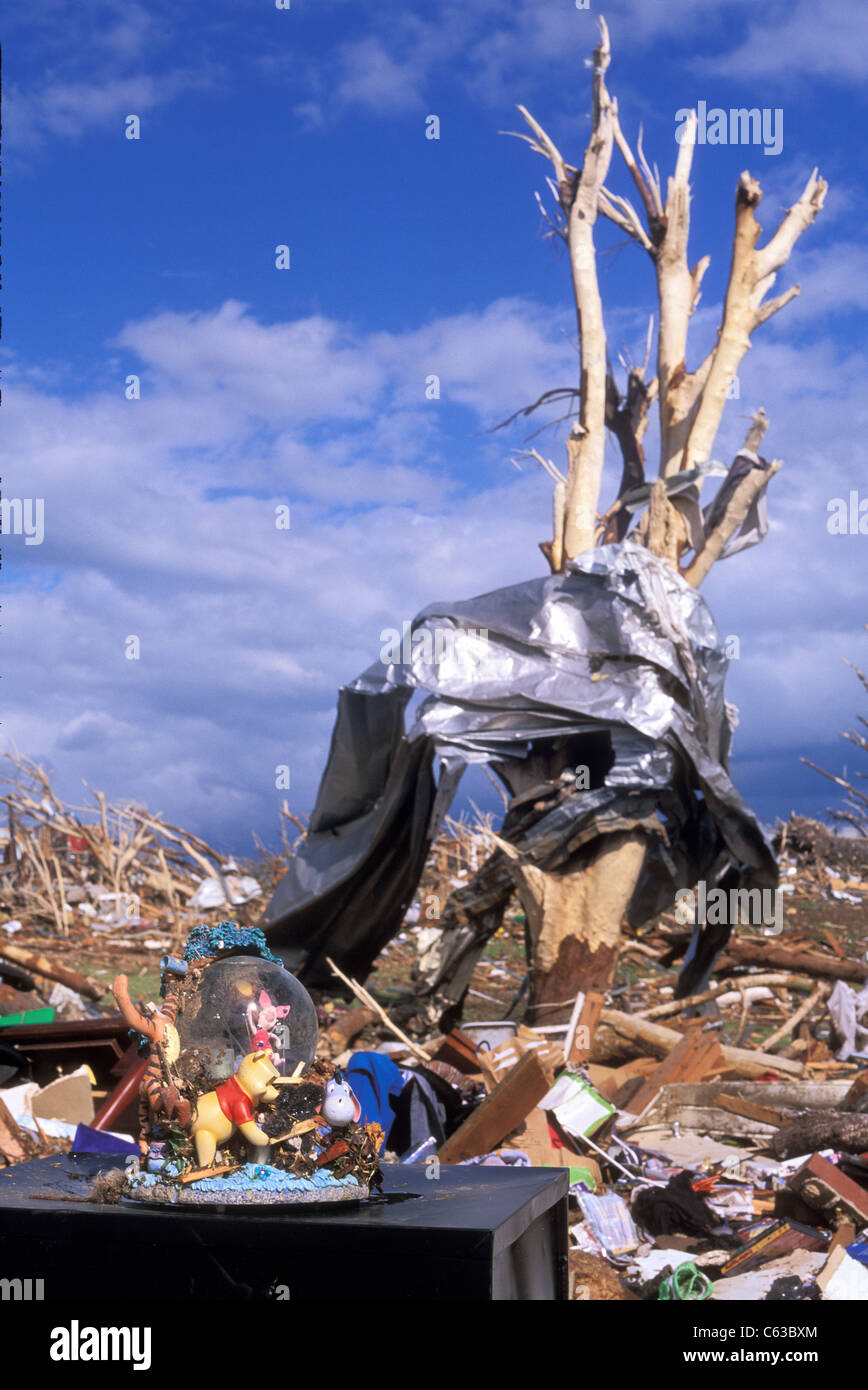 a-snowglobe-rests-on-a-filing-cabinet-atop-the-foundation-of-a-home-C63BXM.jpg