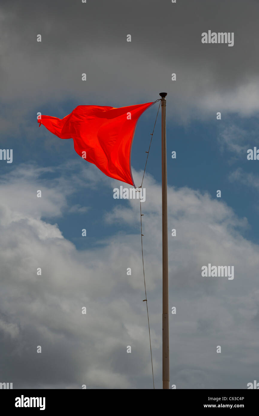 Orange flag flapping flying in the wind Stock Photo - Alamy Orange flag flapping flying in the wind Stock Photo - Alamy