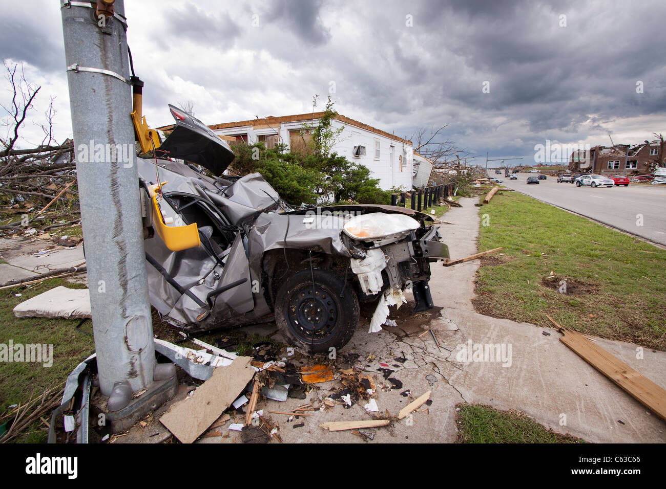 A car wrapped around a traffic signal in Joplin, Missouri, May 25, 2011. Stock Photo