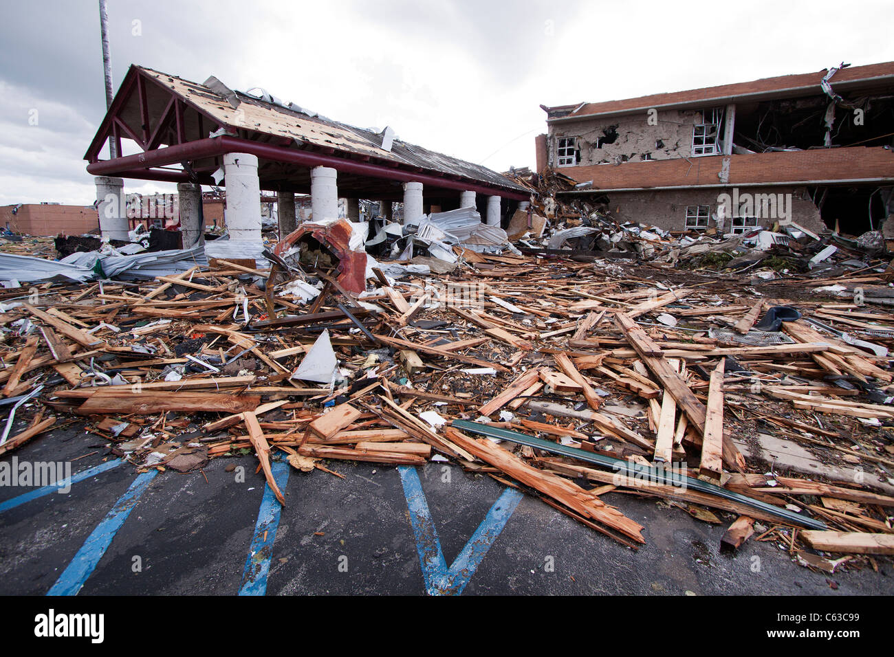 Debris surround the destroyed Joplin High School in Joplin, Missouri