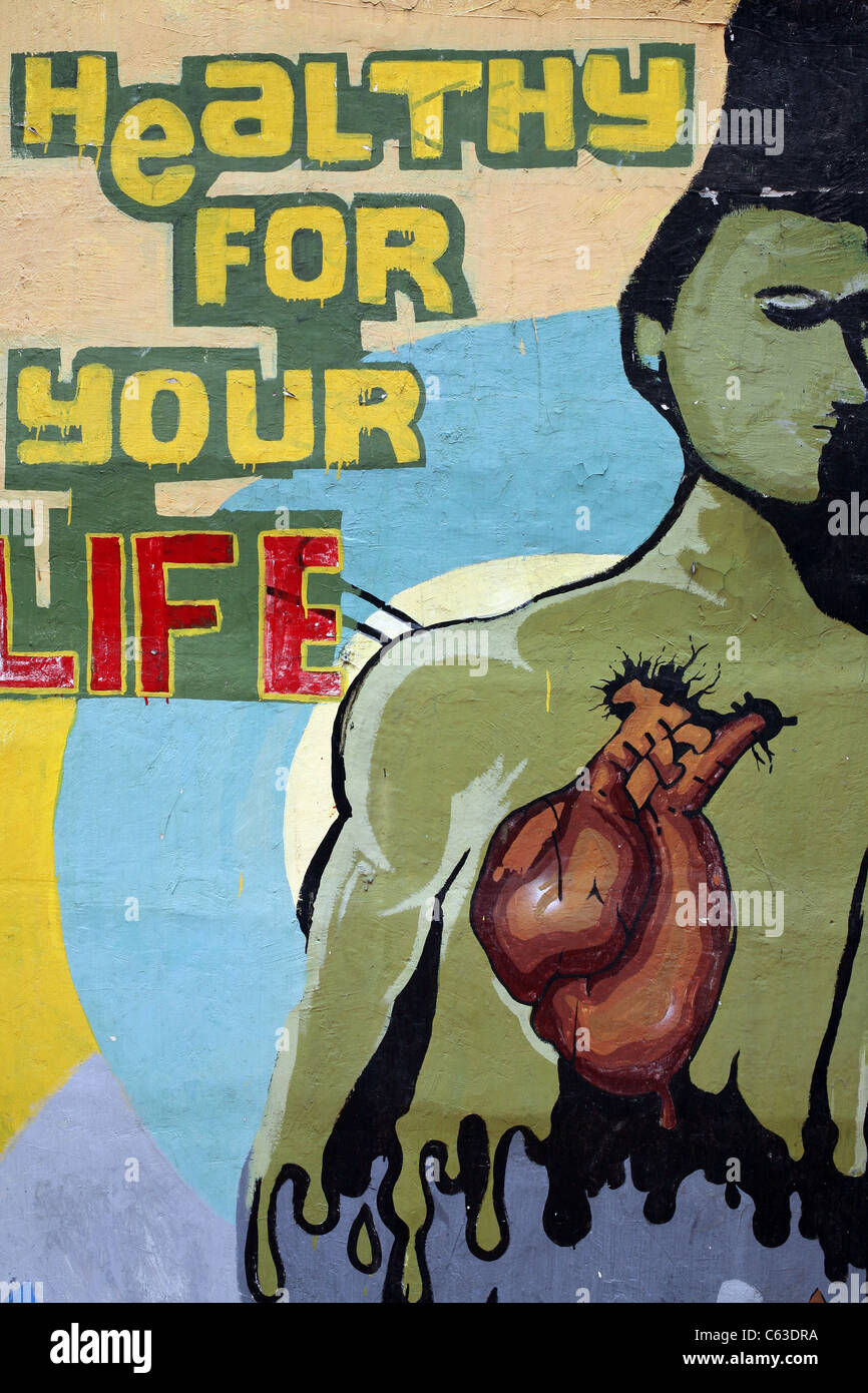 Mural promoting a healthy lifestyle on the exterior wall of Kridosono Stadium Stock Photo