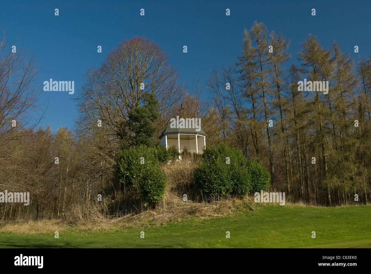 Parkland with small folly at old renaissance period house in berkshire, england near Henley-on-Thames Stock Photo