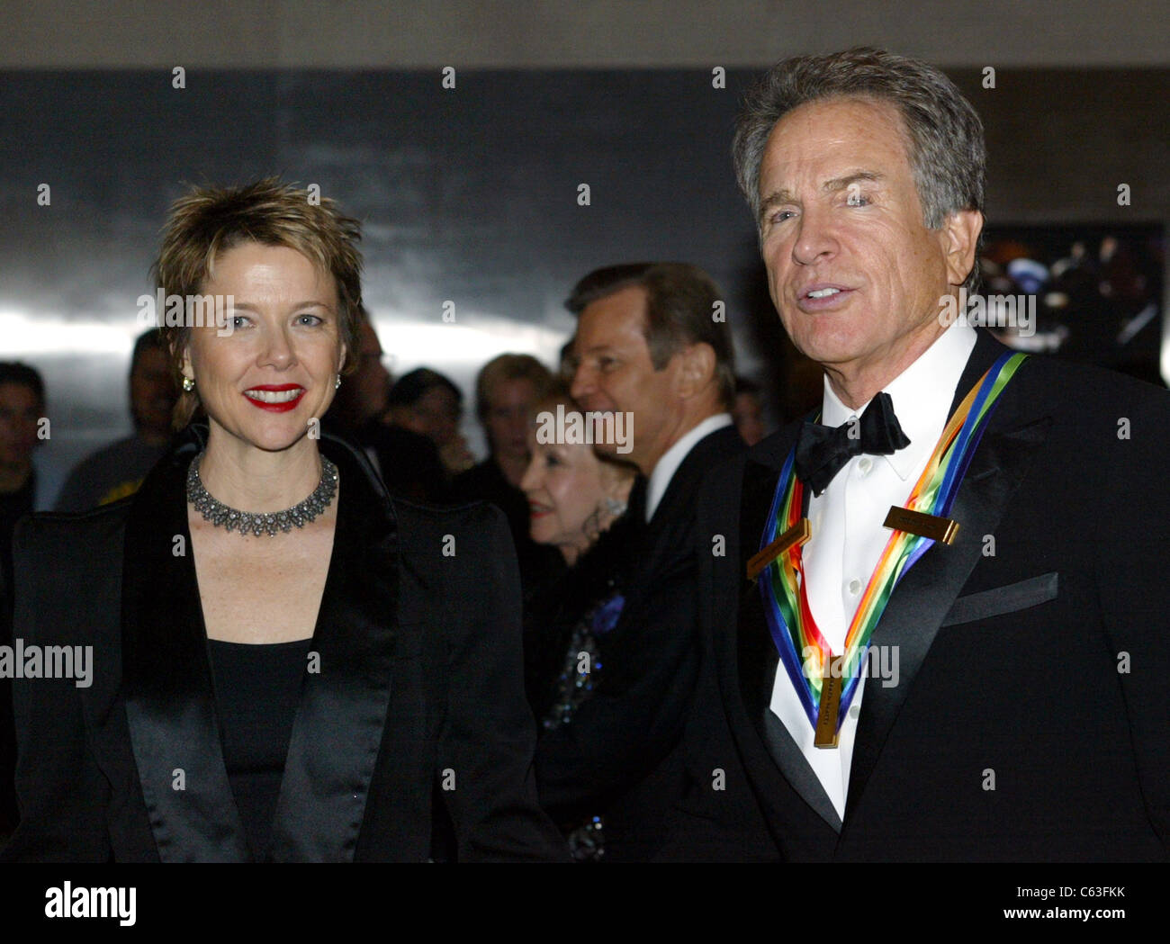 Warren Beatty and his wife Annette Bening arrive for the 27TH ANNUAL KENNEDY CENTER HONORS at the Kennedy Center December 5, 2004 in Washington, D.C. (Photo by Yuri Gripas/Everett Collection) Stock Photo