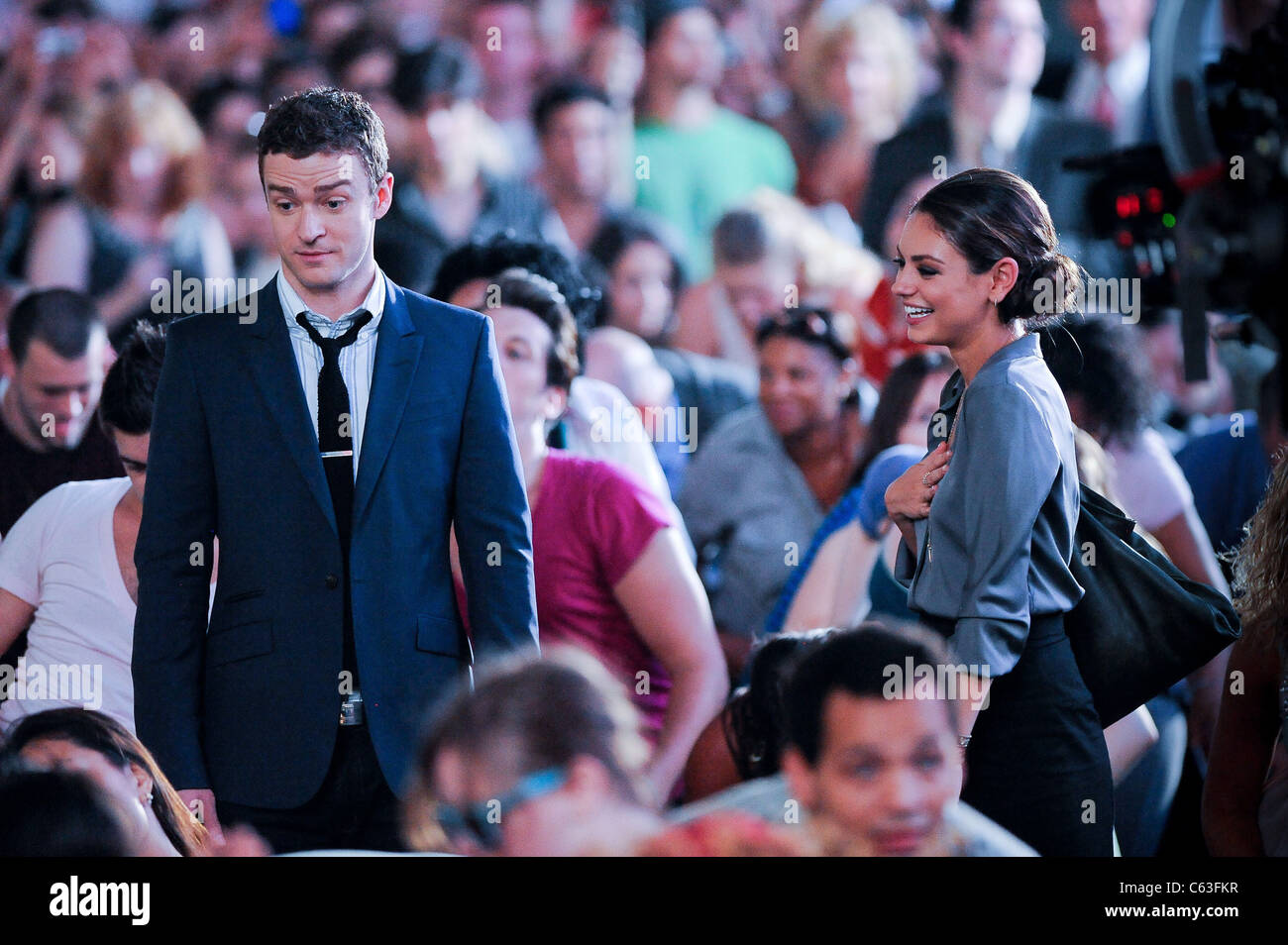 Justin Timberlake, Mila Kunis, film a scene at the 'Friends With Benefits' film set in Times Square out and about for CELEBRITY Stock Photo
