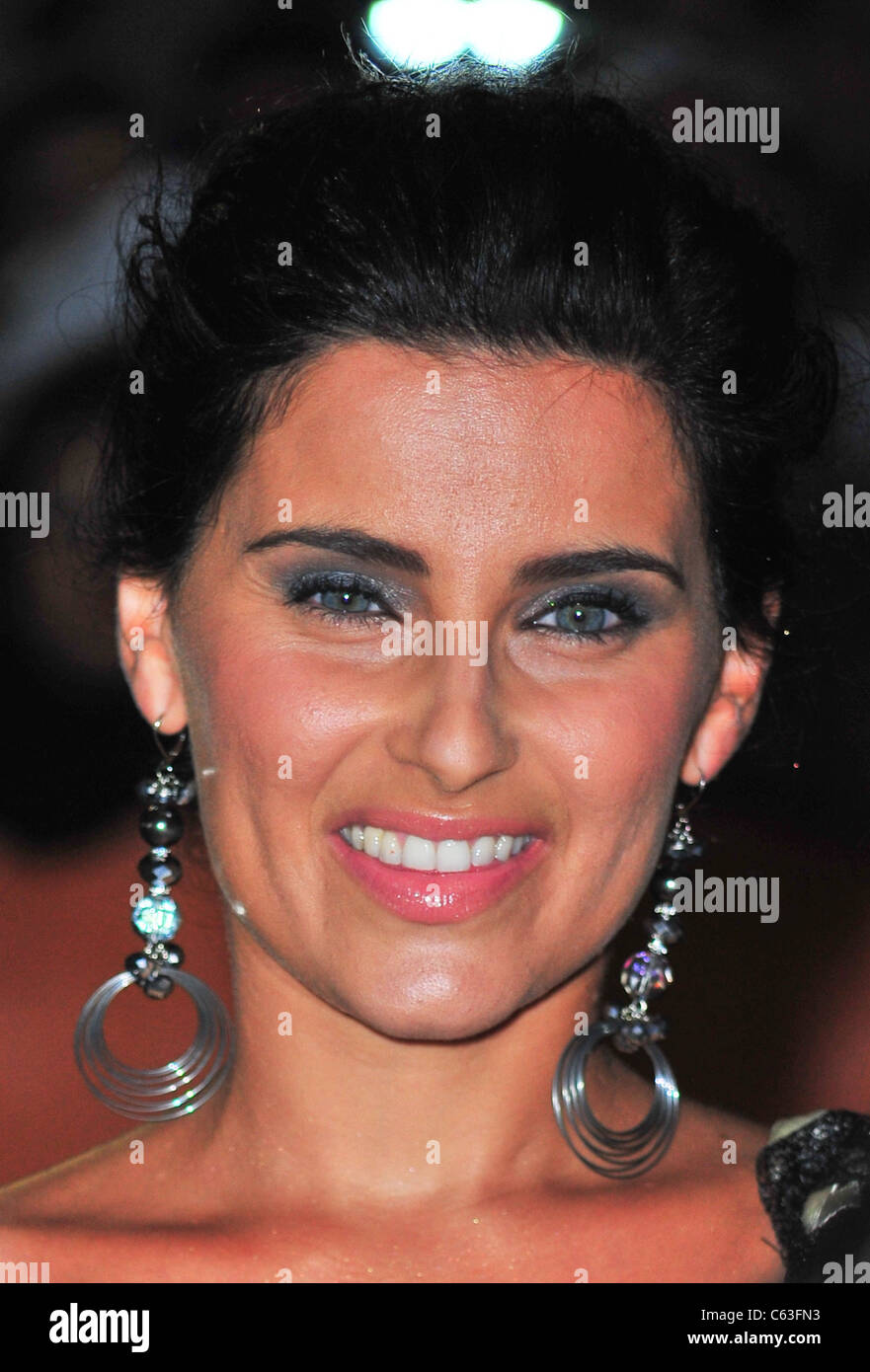 Nelly Furtado at arrivals for SCORE: A HOCKEY MUSICAL Premiere at Toronto International Film Festival Opening Night Gala, Roy Thomson Hall, Toronto, ON September 9, 2010. Photo By: Gregorio T. Binuya/Everett Collection Stock Photo