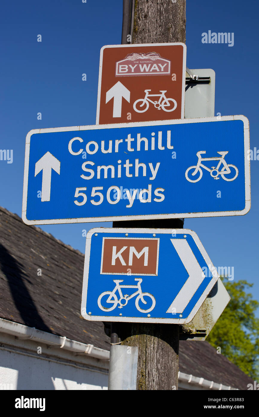 Signage for Kirkpatrick Macmillan (KM) cycle route at Keir Mill Nithsdale Scotland UK Stock Photo