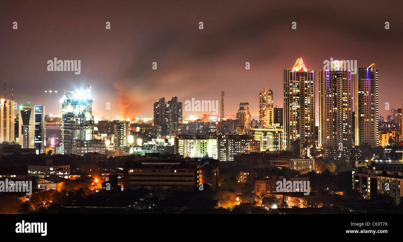 Mumbai, India - April 2011, night time panoramic view of the fire at Bandra railway station from an 18 storey building, landscap Stock Photo