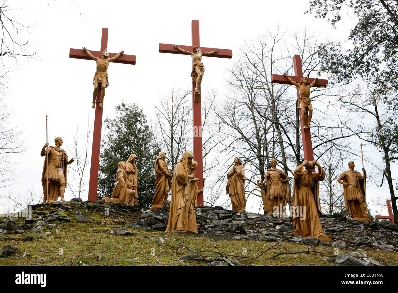 Lourdes in winter: Jesus Christ on the cross, crucifixion, The Calvary. Stock Photo
