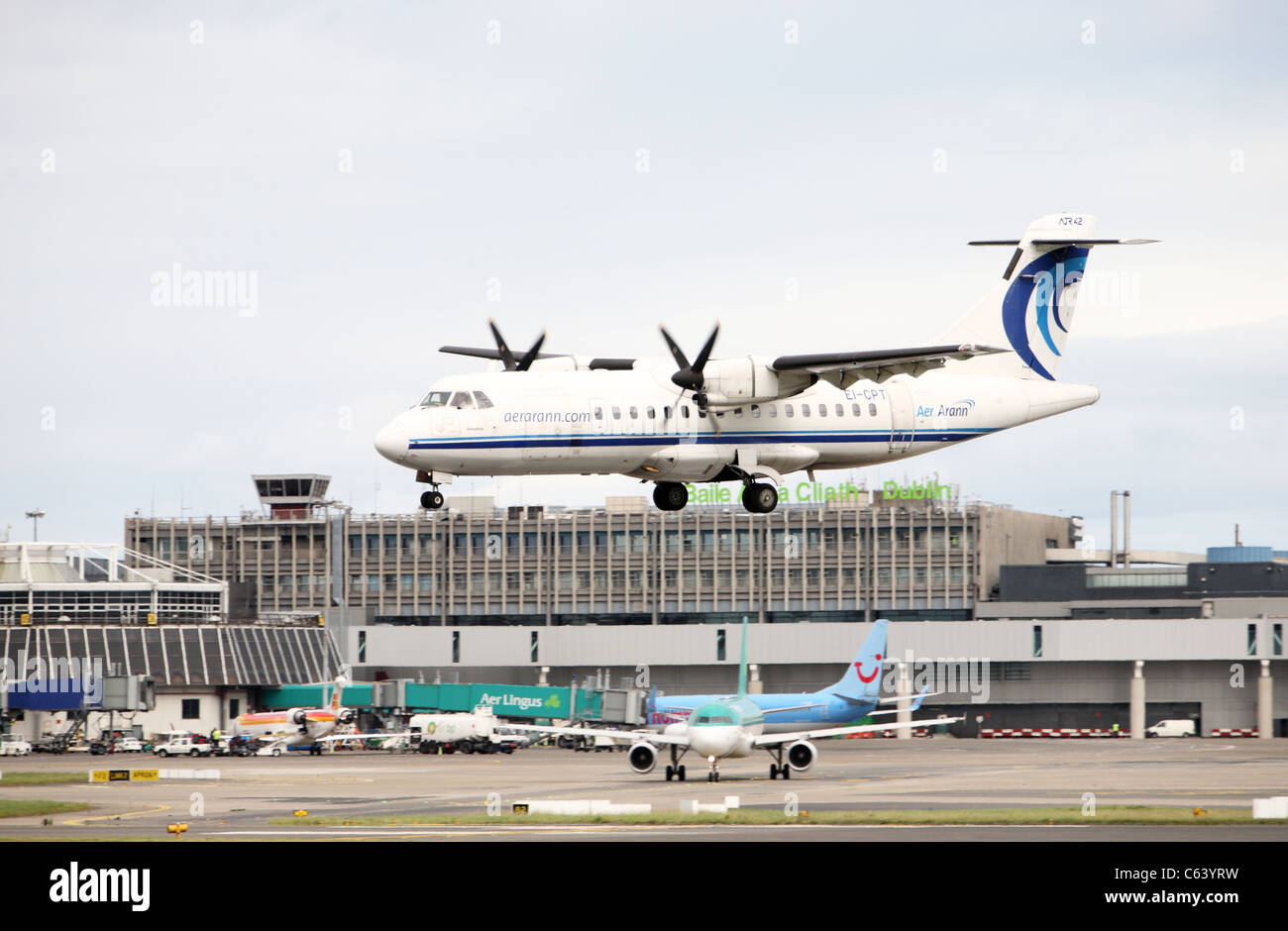 Aer Arran flight landing at Dublin Airport Stock Photo