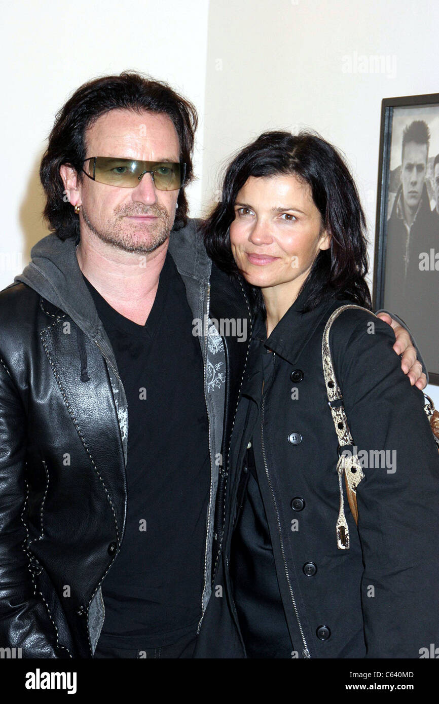 Bono, Ali Hewson at arrivals for Anton Corbijn photo exhibition celebrating 22 years of U2, Stellan Holm Gallery, New York, NY, October 09, 2005. Photo by: Rob Rich/Everett Collection Stock Photo