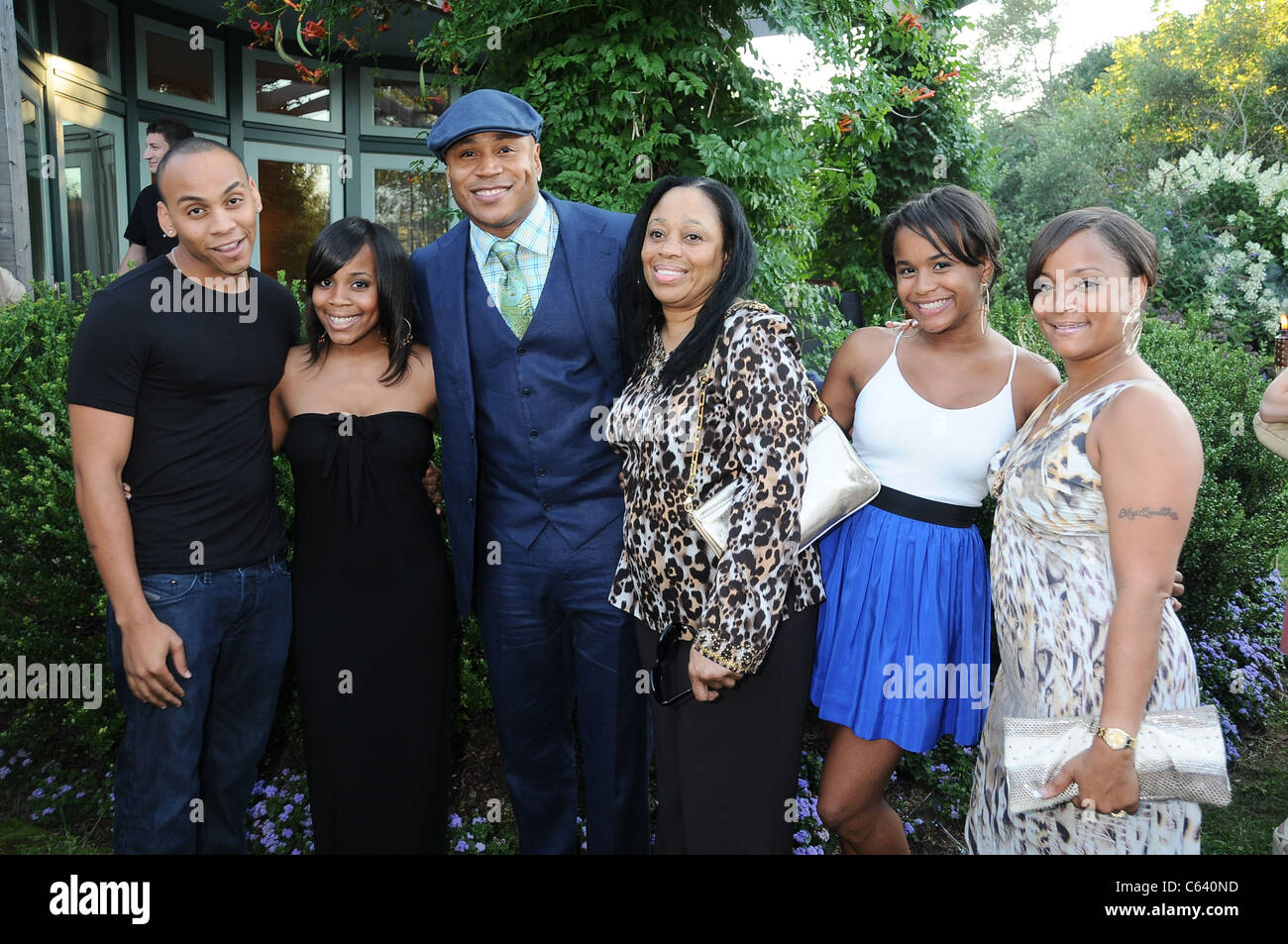Najee Smith, Italia Smith, LL Cool J, Ondrea Smith, Samaria Smith, Simone Smith at a public appearance for Red Hot Red Cross Cocktails, , Sagaponack, NY August 7, 2010. Photo By: Rob Rich/Everett Collection Stock Photo
