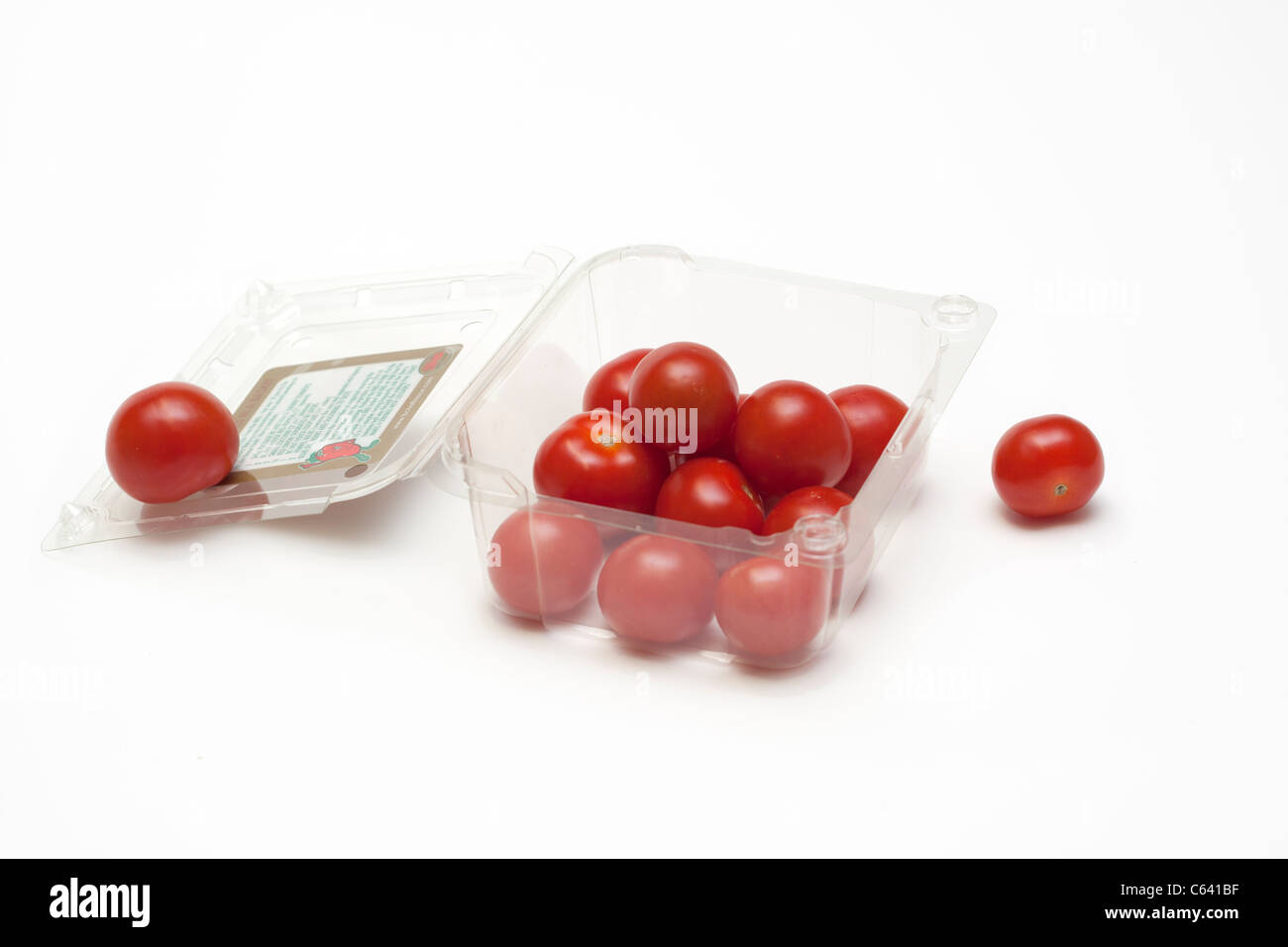 Cherry tomatoes with plastic box Stock Photo