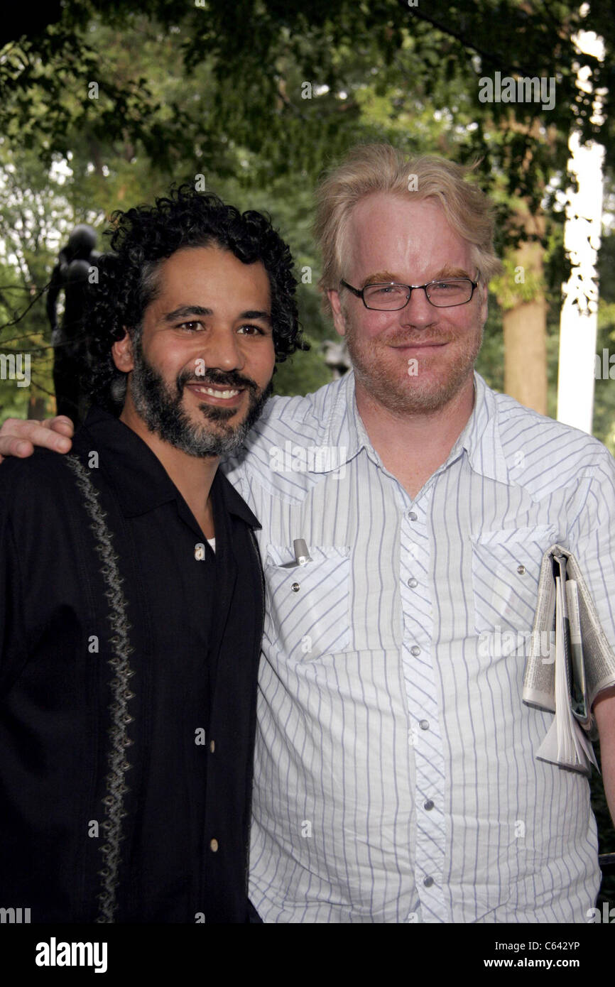 John Ortiz, Phillip Seymour Hoffman at arrivals for The Public Theater Shakespeare in the Park Opening Night, The Delacorte Theater in Central Park, New York, NY, July 12, 2005. Photo by: Fernando Leon/Everett Collection Stock Photo