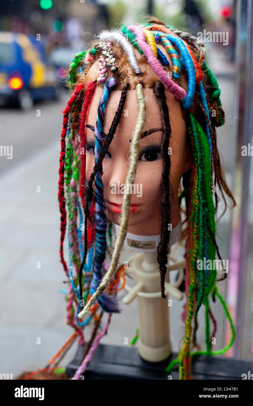 mannequin head with coloured dreadlocks, Camden, London, England, UK