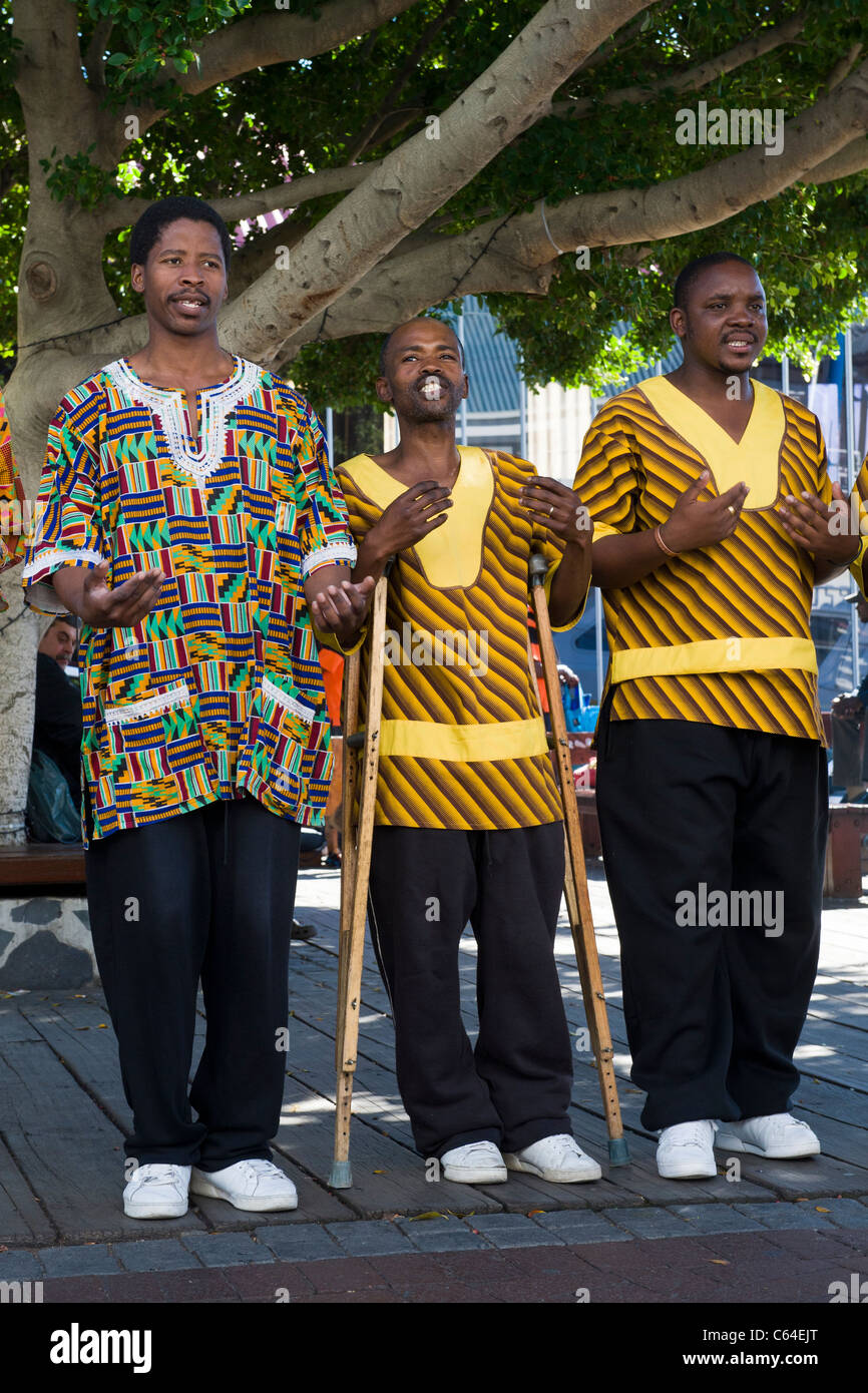 Chorus singer on crutches performing at V&A Waterfront in Cape Town