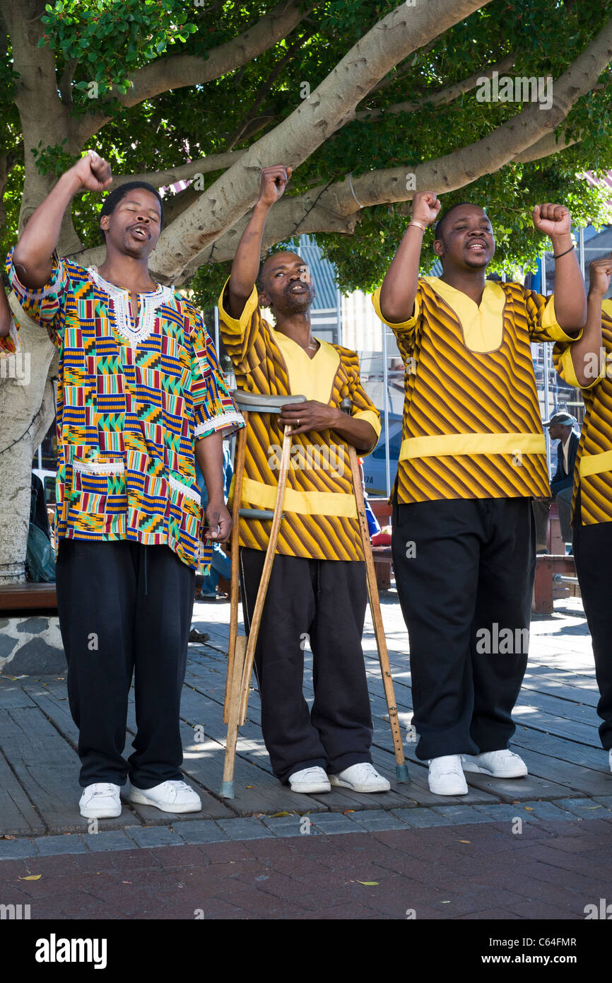 Chorus singer on crutches performing at V&A Waterfront in Cape Town