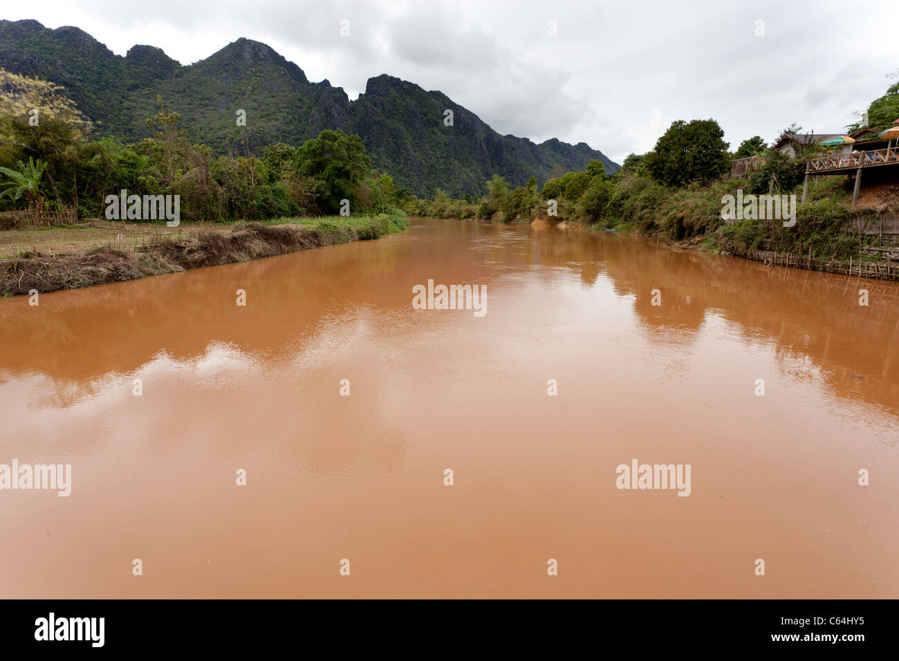 Nam Song river under cloudy weather in vang vieng, laos Stock Photo