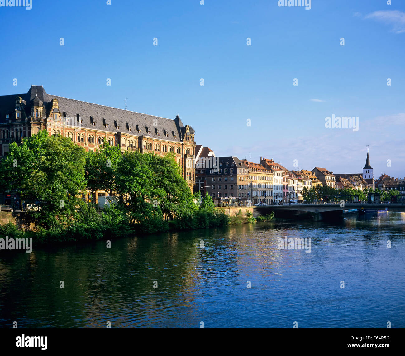 Gallia building, student residence, dorm accomodation,Ill river, waterfront houses perspective, sunset, Strasbourg, Alsace, France, Europe, Stock Photo