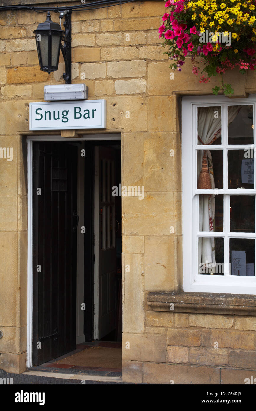 entrance to the Snug bar of the White Hart Royal Hotel, High Street, Moreton in Marsh in the Cotswolds, Gloucestershire, UK in July Stock Photo