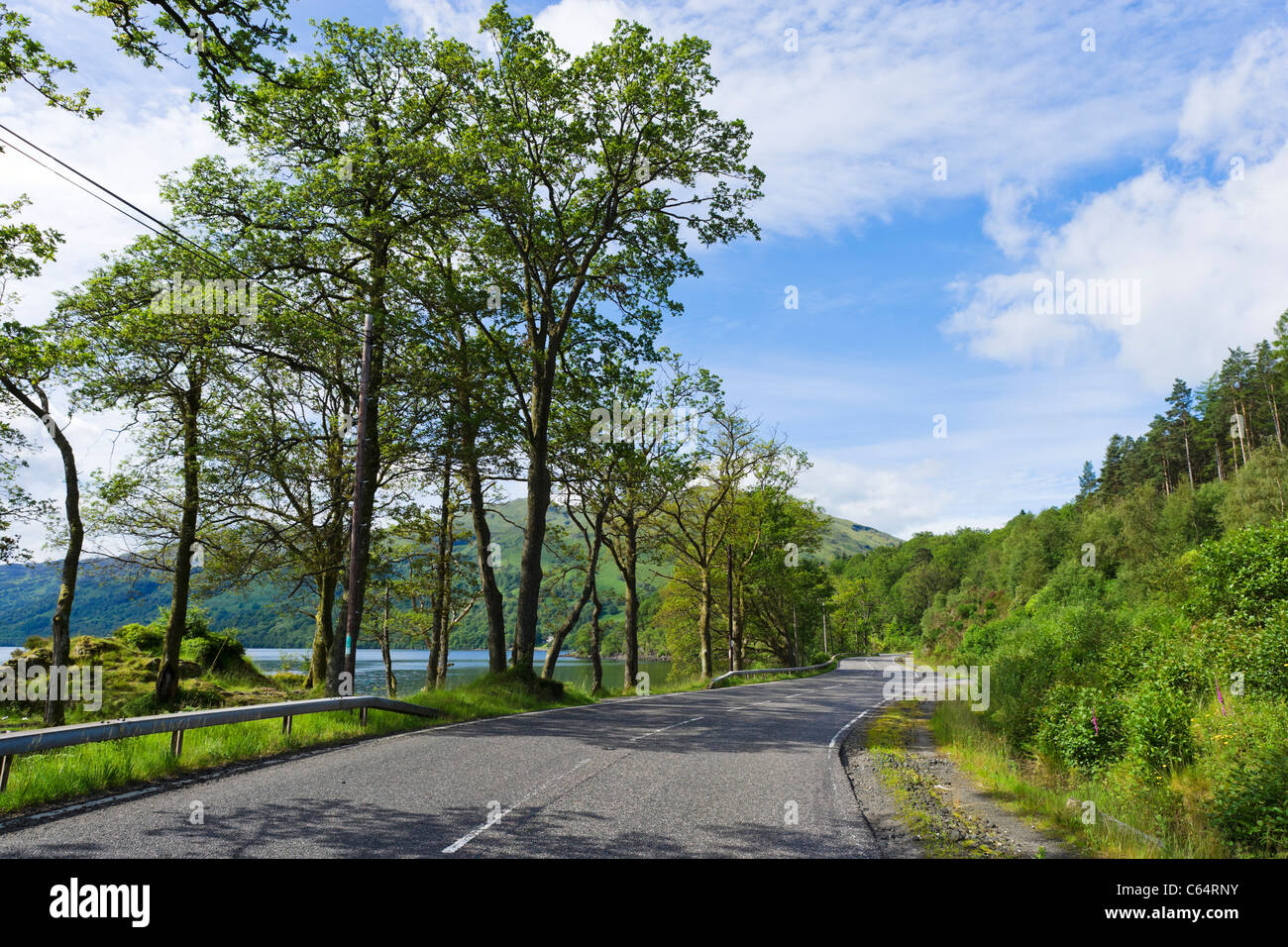 The A82 road north of Luss on the west bank of Loch Lomond, Argyll and Bute, Scotland, UK Stock Photo